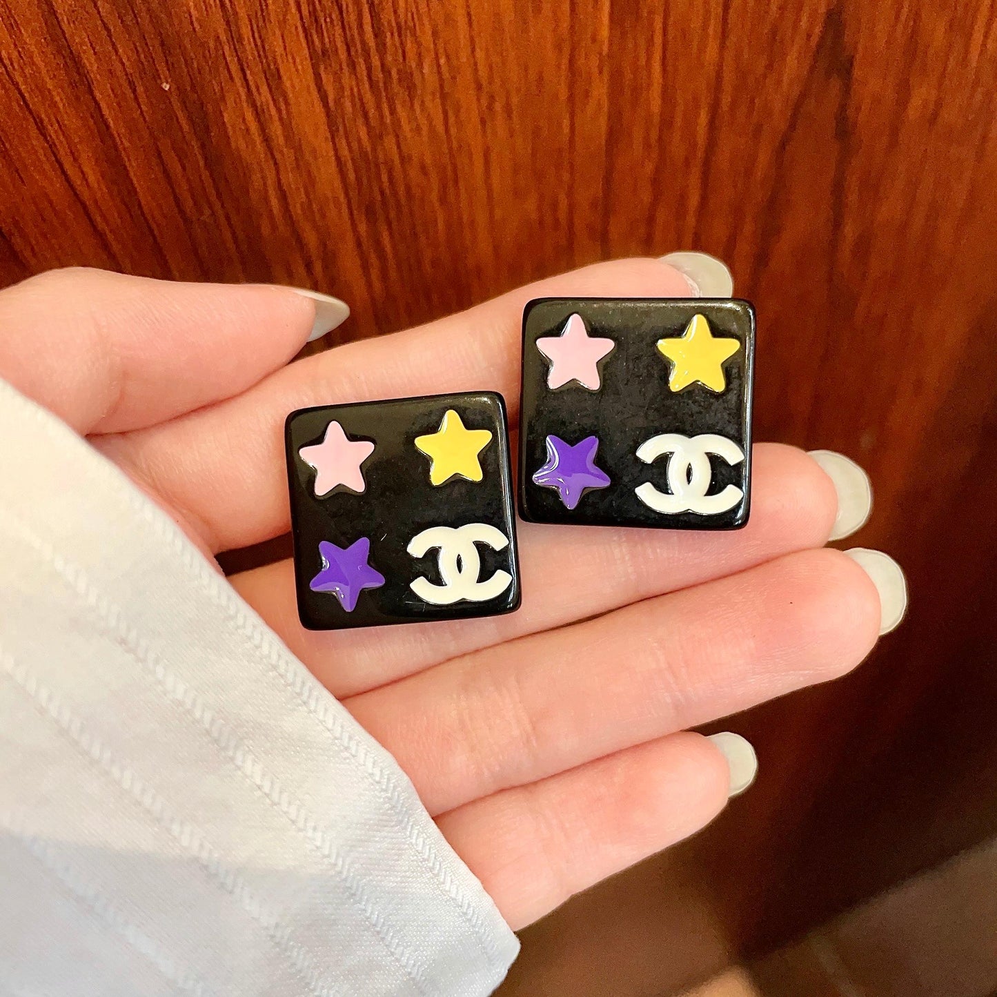 Double-C Emblem Stud Earrings in Polished Metal-Tone – Star Detail – Design 004 side detail