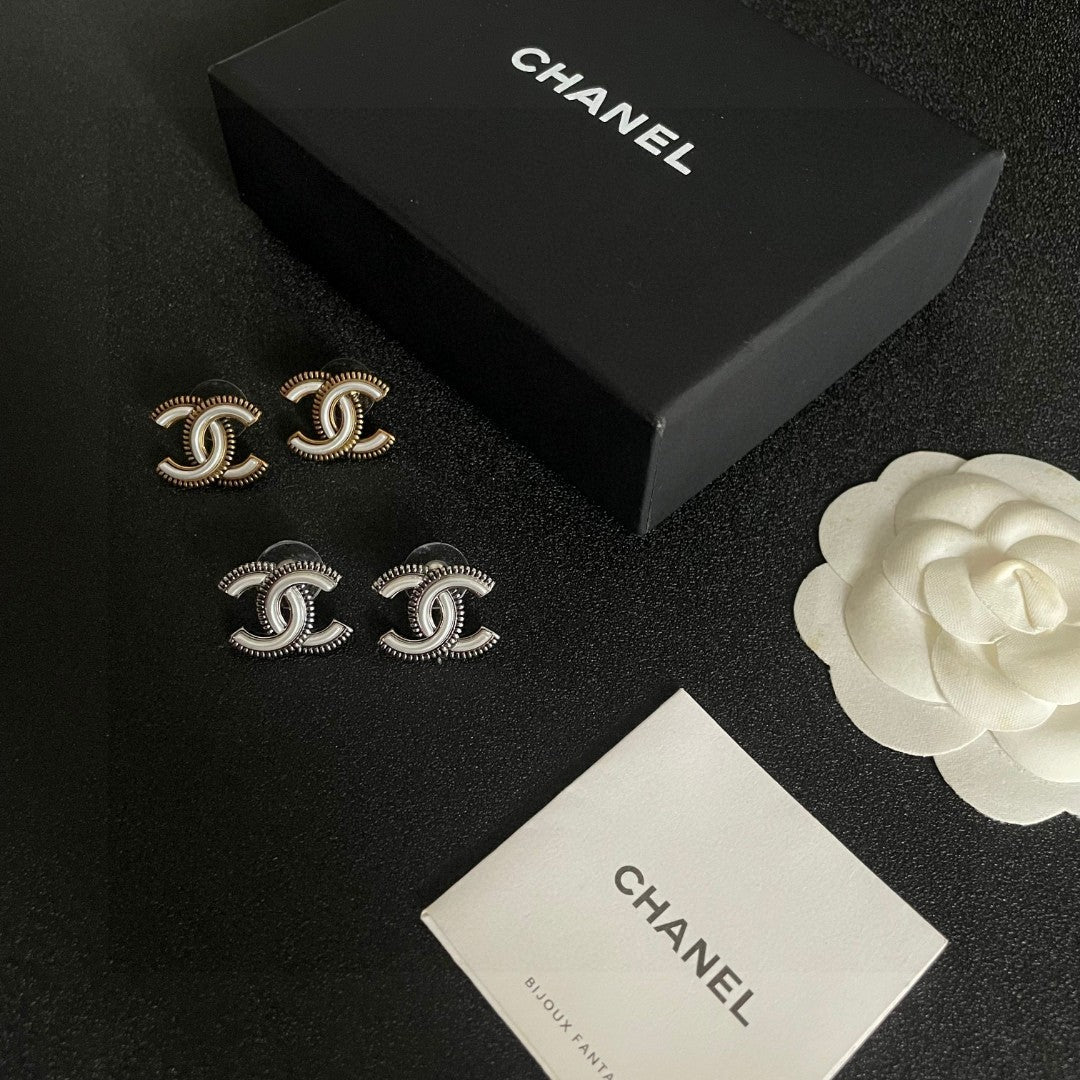 Double-C Emblem Stud Earrings in Polished Metal-Tone – Design 195 close-up detail