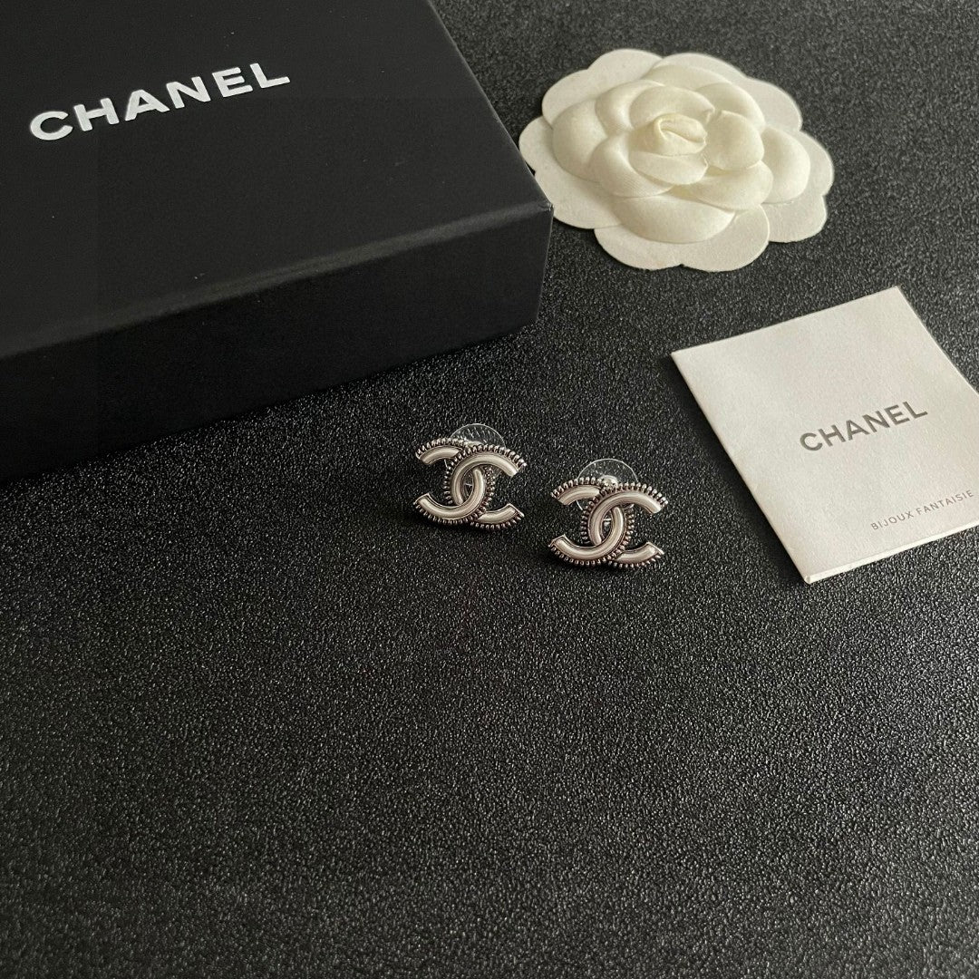 Double-C Emblem Stud Earrings in Polished Metal-Tone – Design 195 styled product view