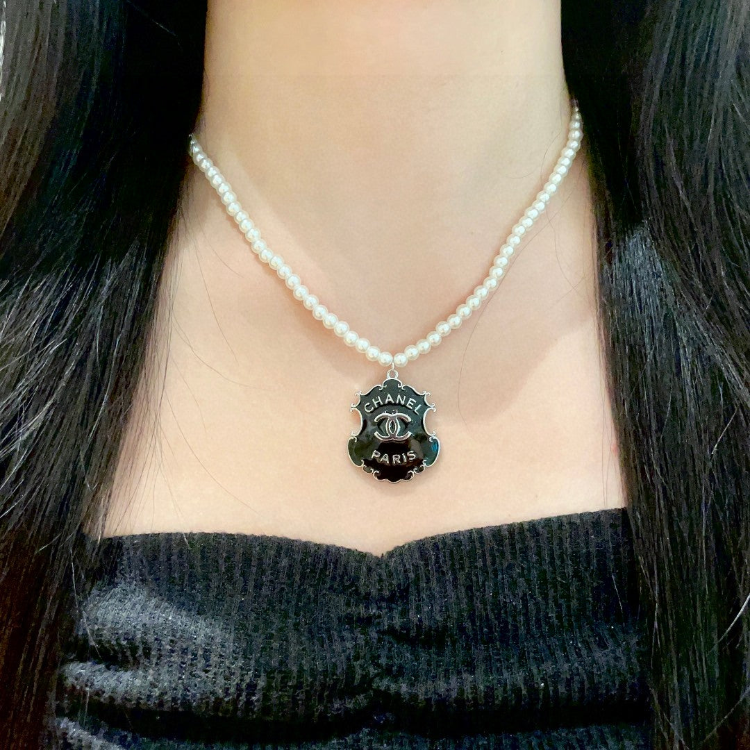 Double-C Emblem Pearl-Detail Pendant Necklace – Pearl Detail – Design 003 detail view