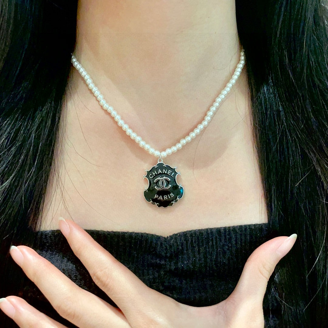 Double-C Emblem Pearl-Detail Pendant Necklace – Pearl Detail – Design 003 front product view