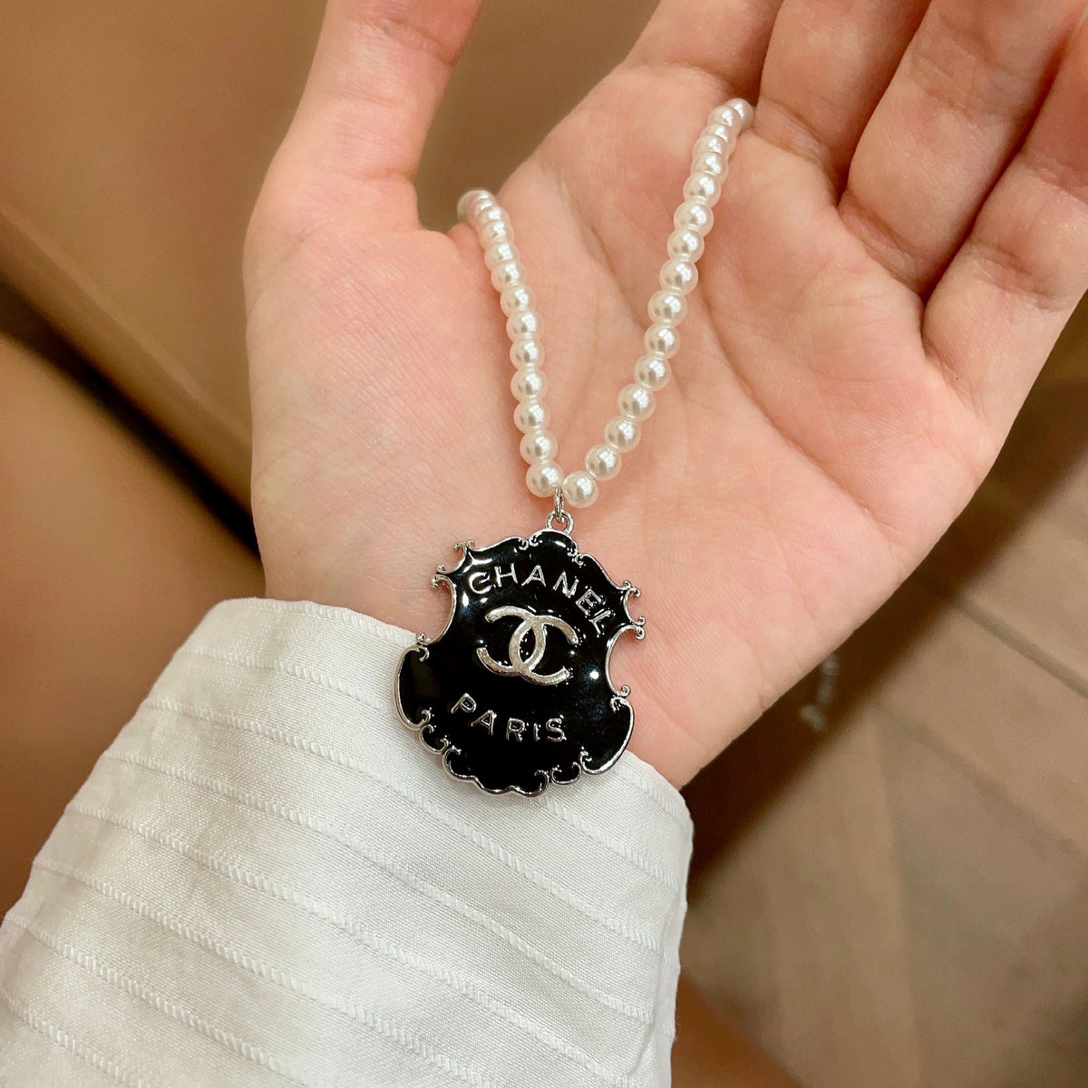 Double-C Emblem Pearl-Detail Pendant Necklace – Pearl Detail – Design 003 side detail