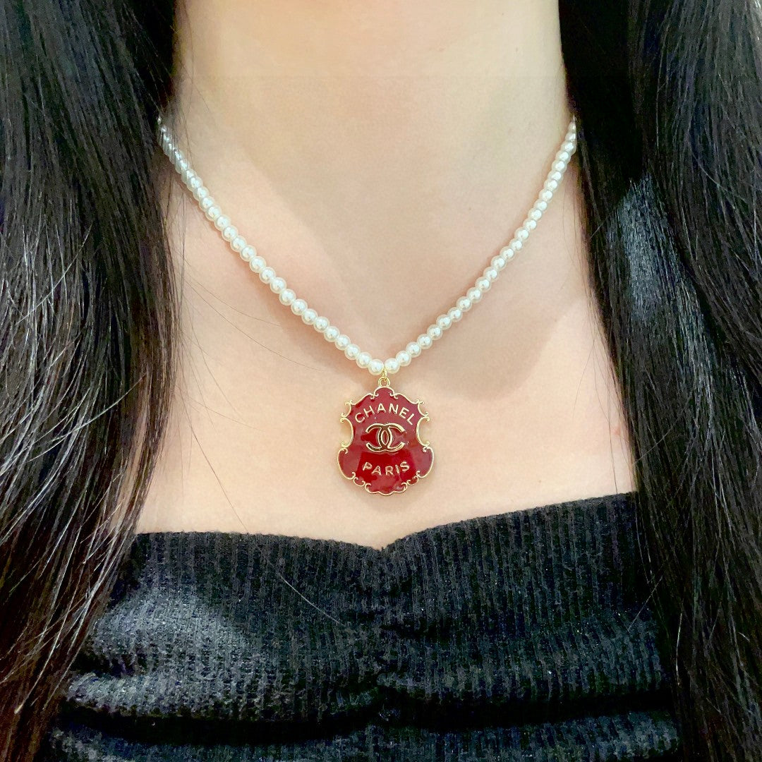 Double-C Emblem Pearl-Detail Pendant Necklace – Pearl Detail – Design 002 detail view