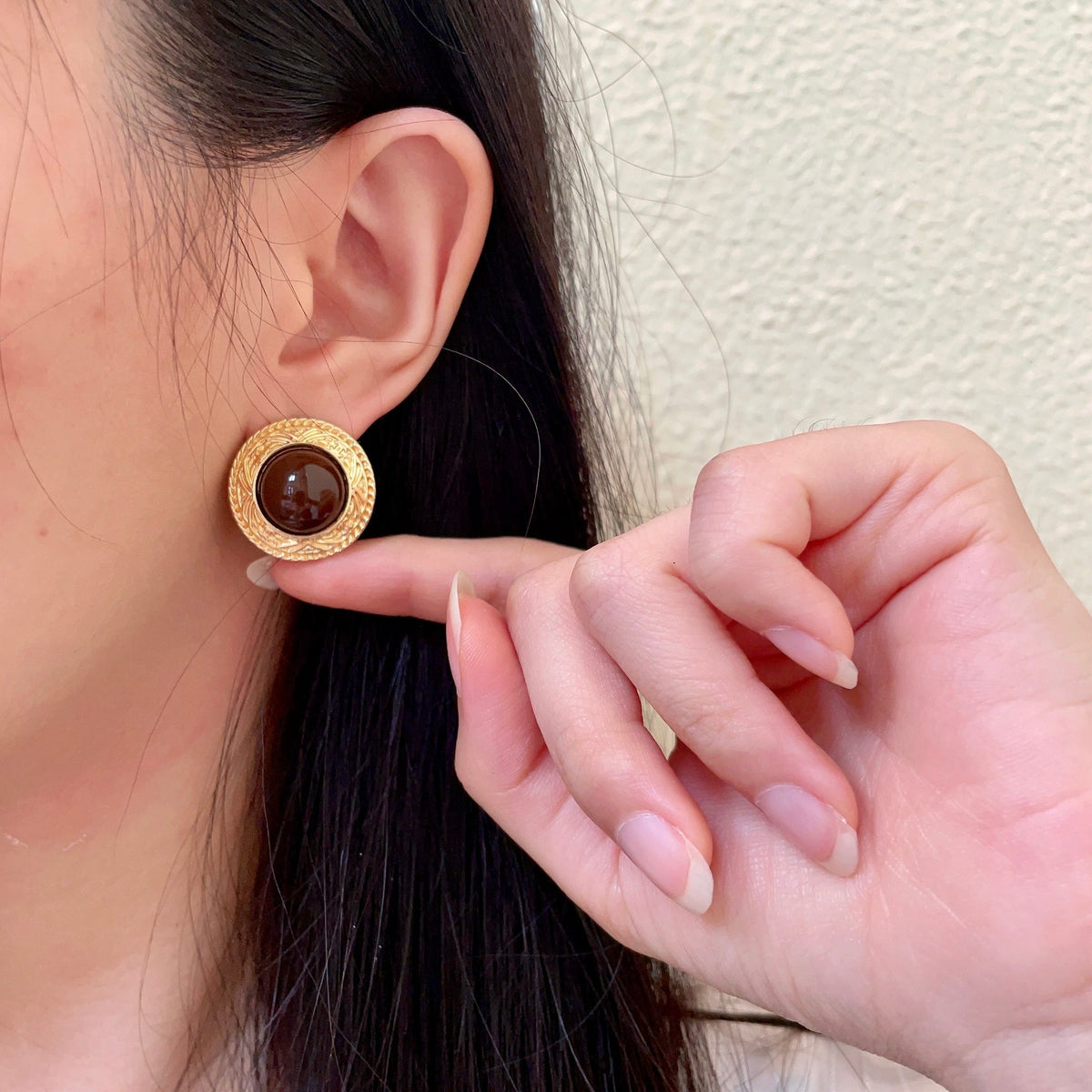 Double-C Emblem Stud Earrings in Polished Metal-Tone – Design 113 front product view