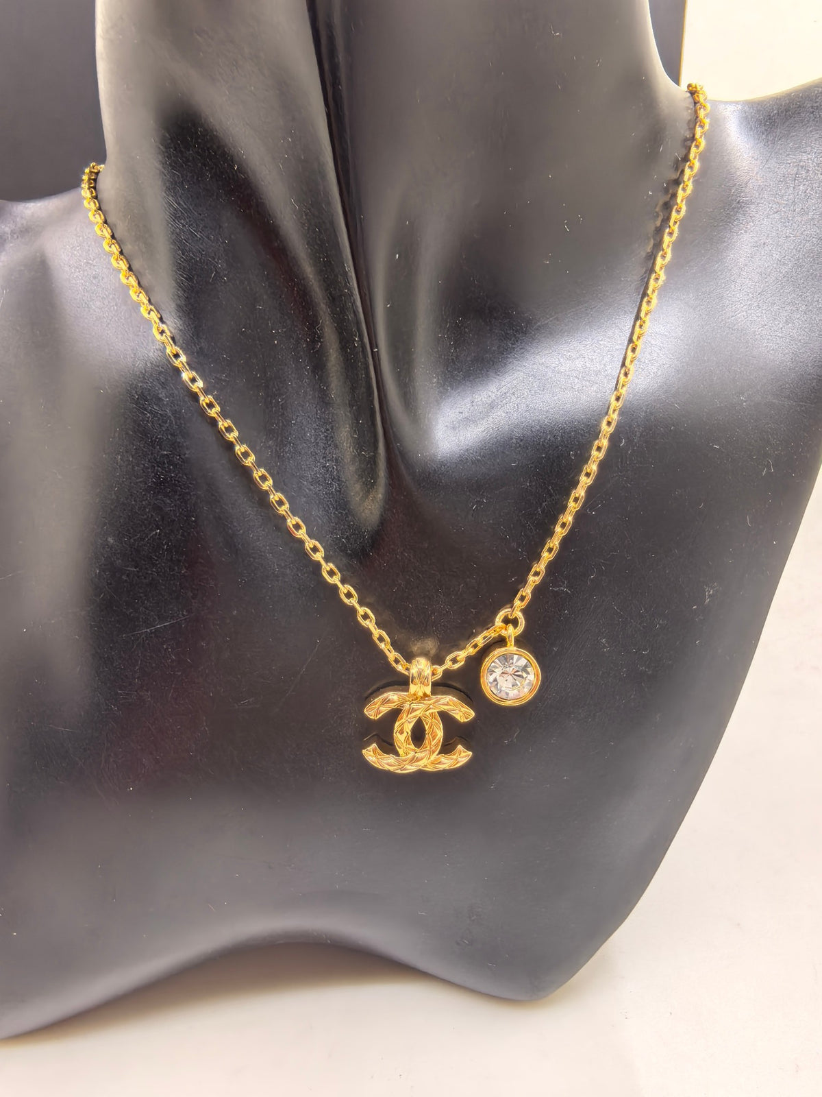 Signature Emblem Crystal-Accent Pendant Necklace – White Detail front product view