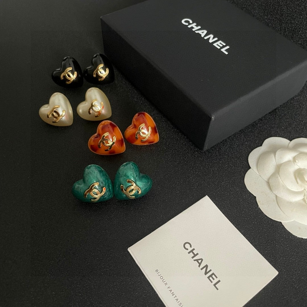 Double-C Emblem Stud Earrings in Polished Metal-Tone – Heart Detail close-up detail