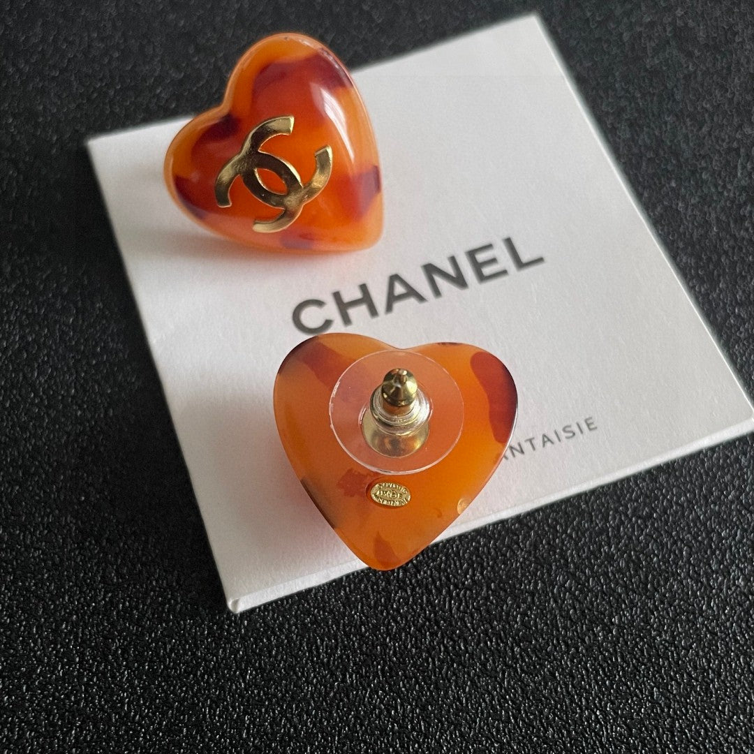 Double-C Emblem Stud Earrings in Polished Metal-Tone – Heart Detail main product view