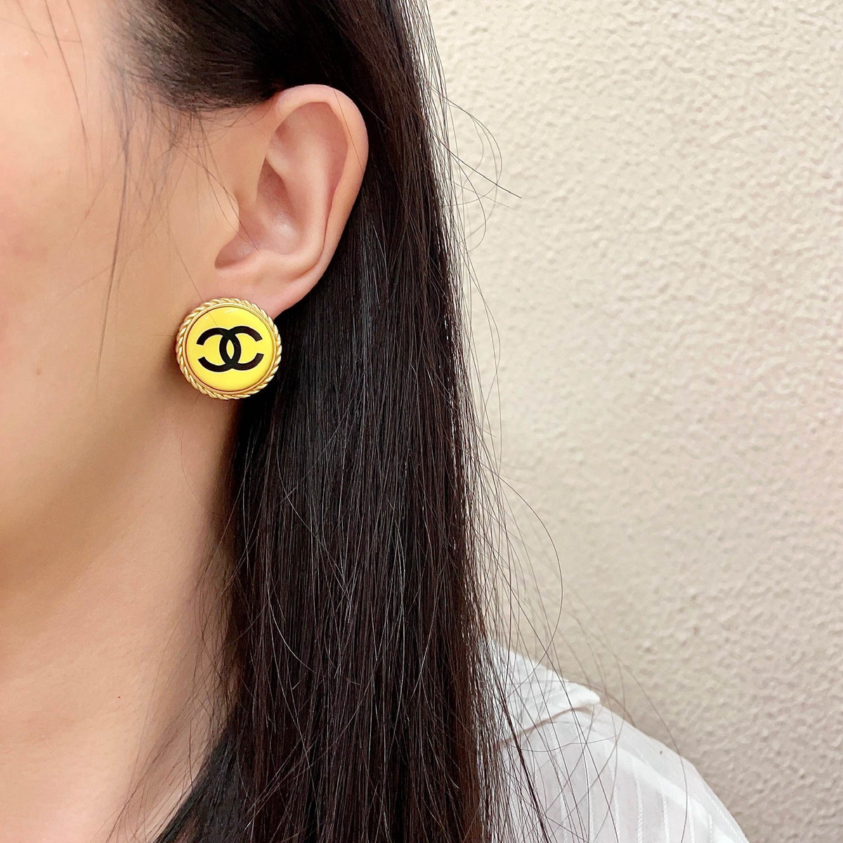 Double-C Emblem Stud Earrings in Polished Metal-Tone – Design 214 detail view