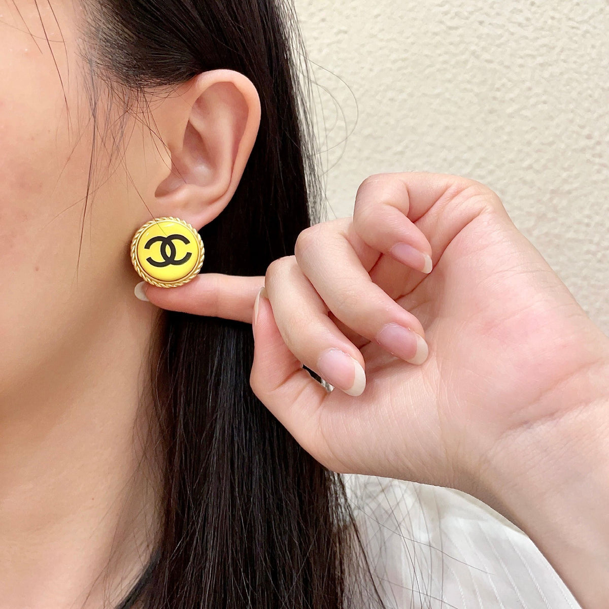Double-C Emblem Stud Earrings in Polished Metal-Tone – Design 214 front product view