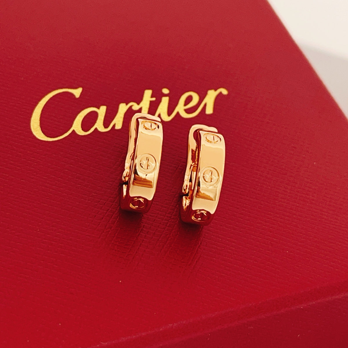 Rose Motif Stud Earrings in Rose-Gold-Tone – Design 01 front view