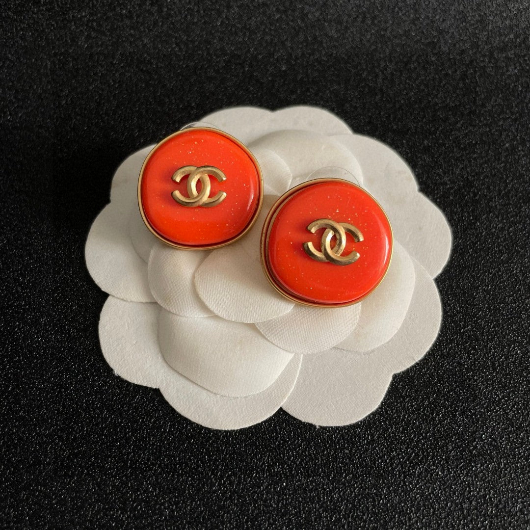Double-C Emblem Stud Earrings in Polished Metal-Tone – Design 259 front product view