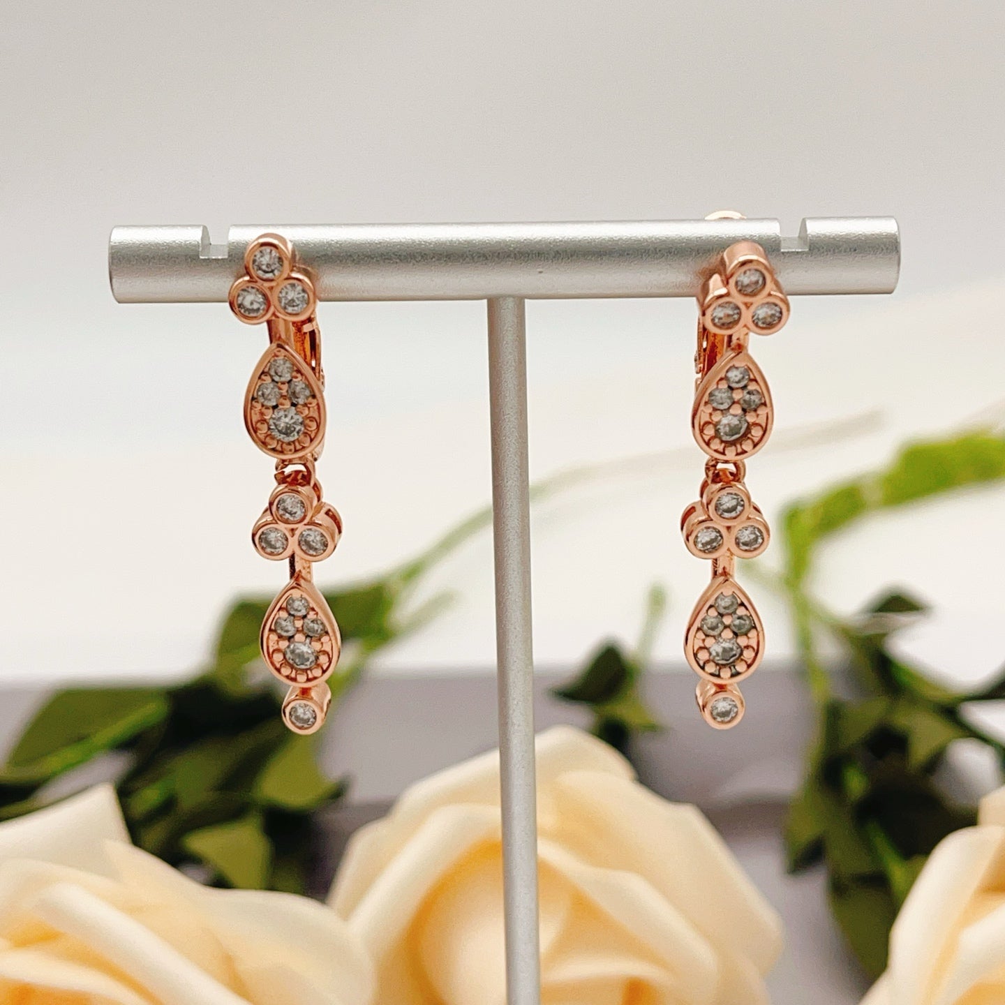 Rose Motif Stud Earrings in Rose-Gold-Tone – Design 02 styled view