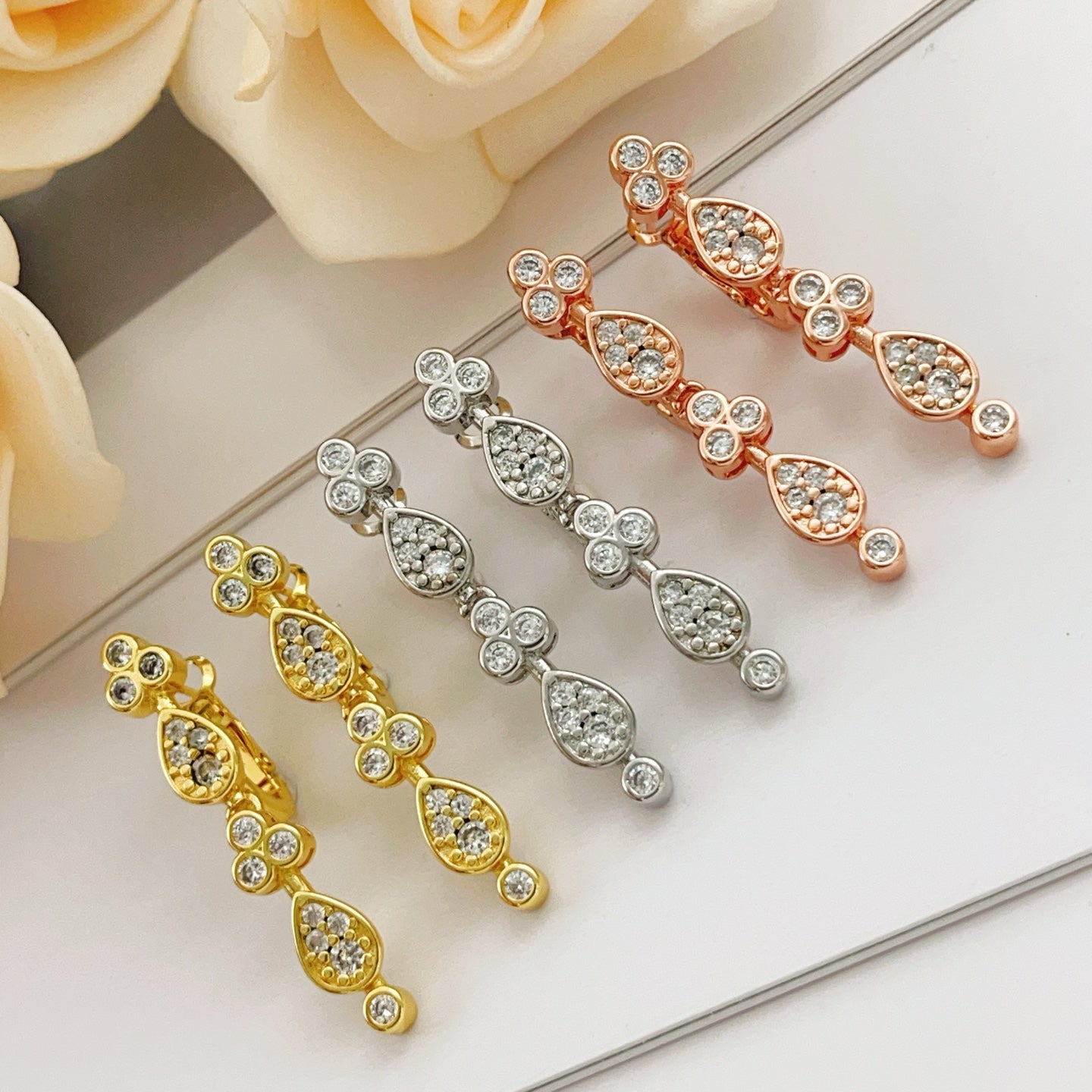 Rose Motif Stud Earrings in Rose-Gold-Tone – Design 02 close-up detail