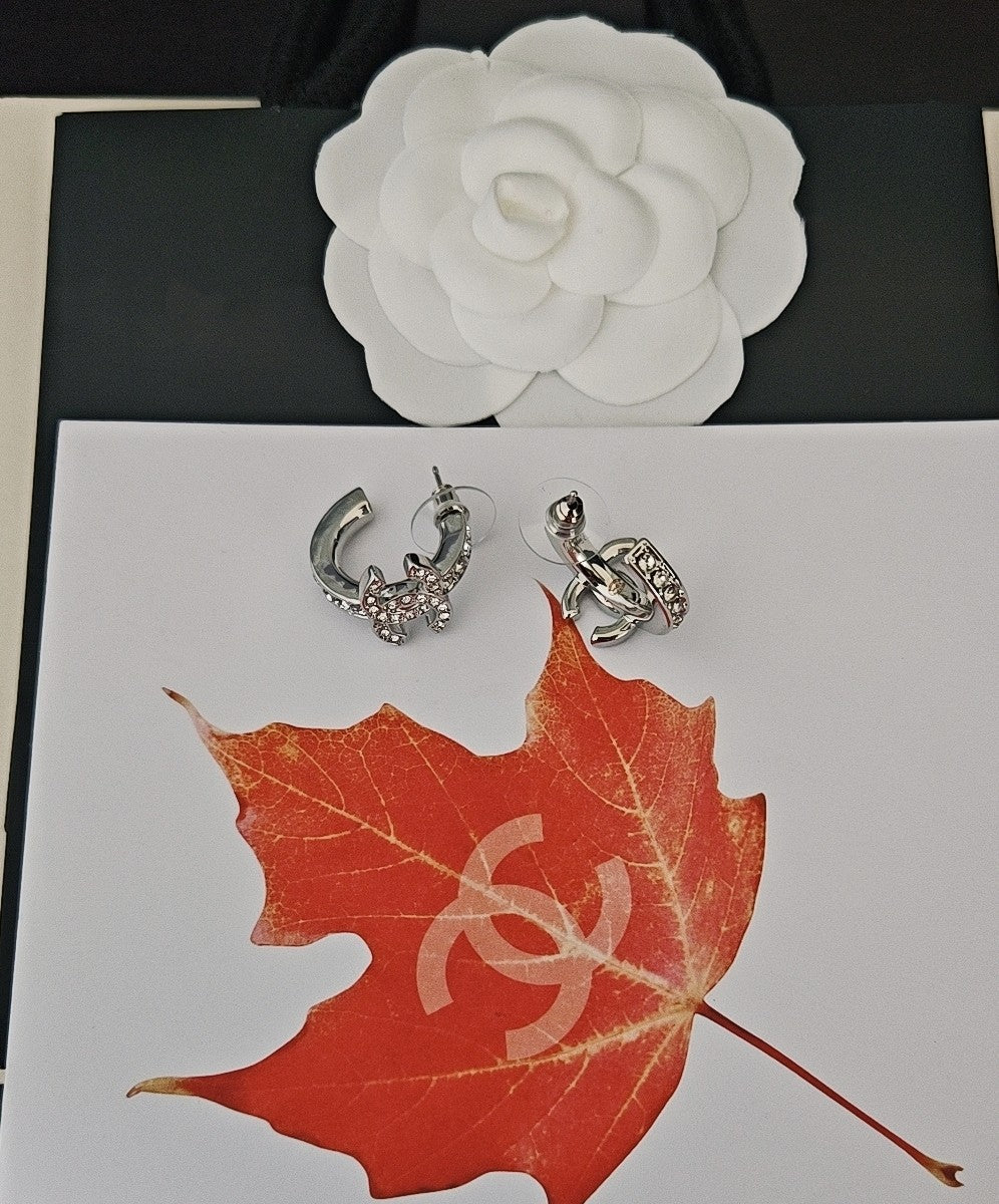 Signature Emblem Jewelry Accessory in Gold-Tone – White Detail side detail