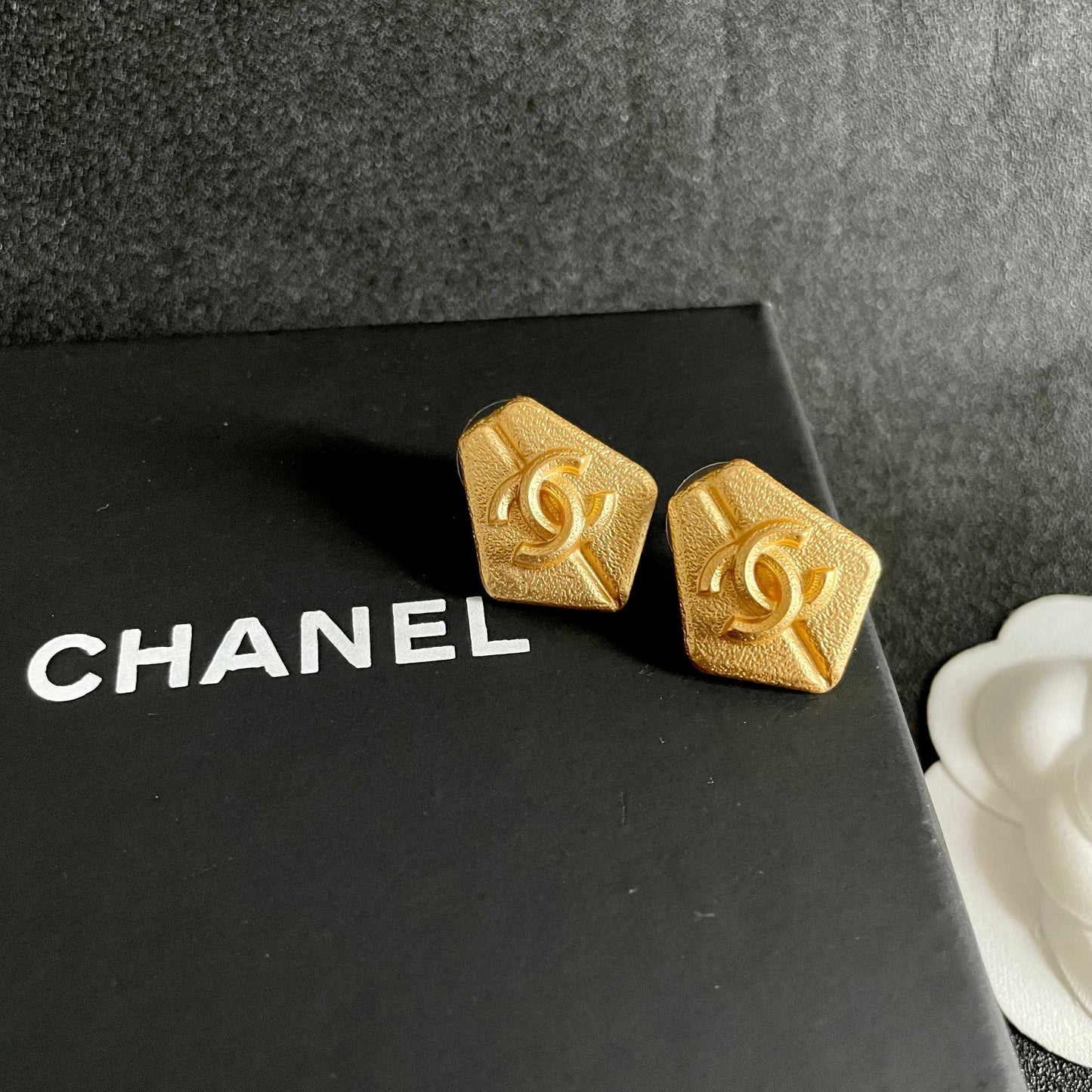 Double-C Emblem Stud Earrings in Polished Metal-Tone – Design 289 detail view