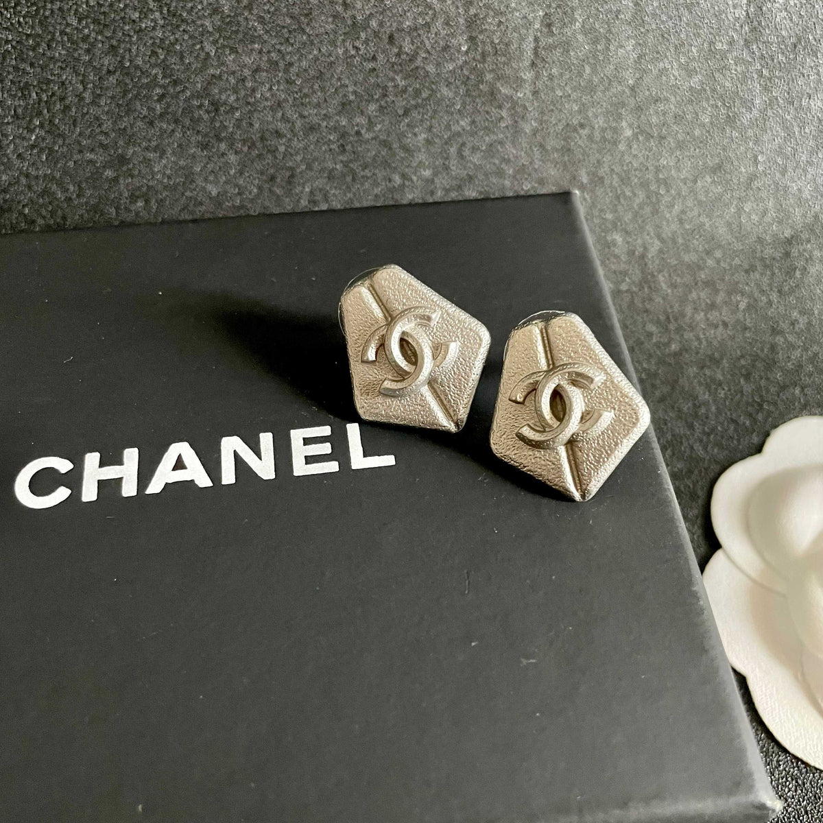 Double-C Emblem Stud Earrings in Polished Metal-Tone – Design 288 detail view