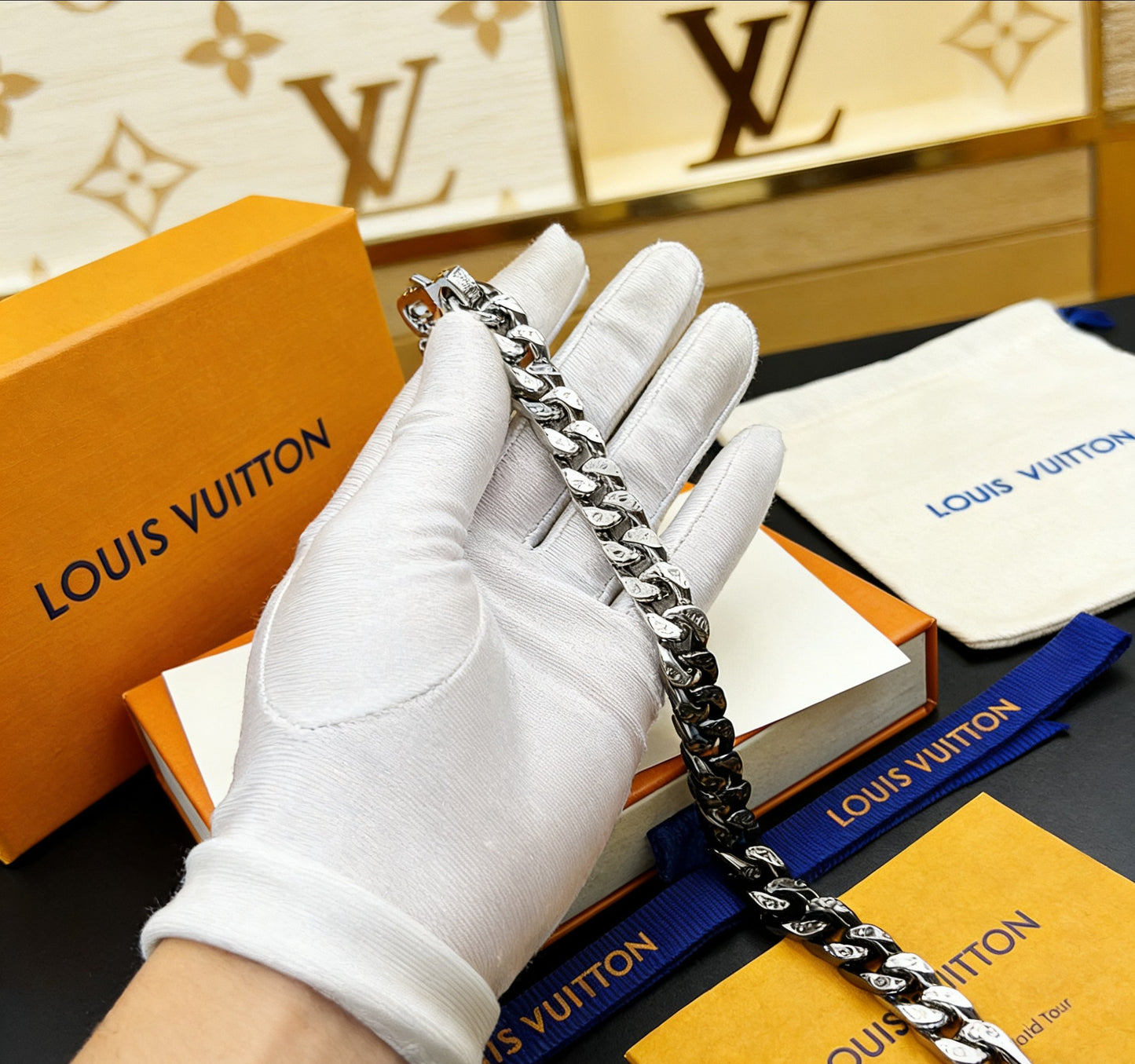 Signature Emblem Bracelet in Polished Metal-Tone – Black Detail close-up detail