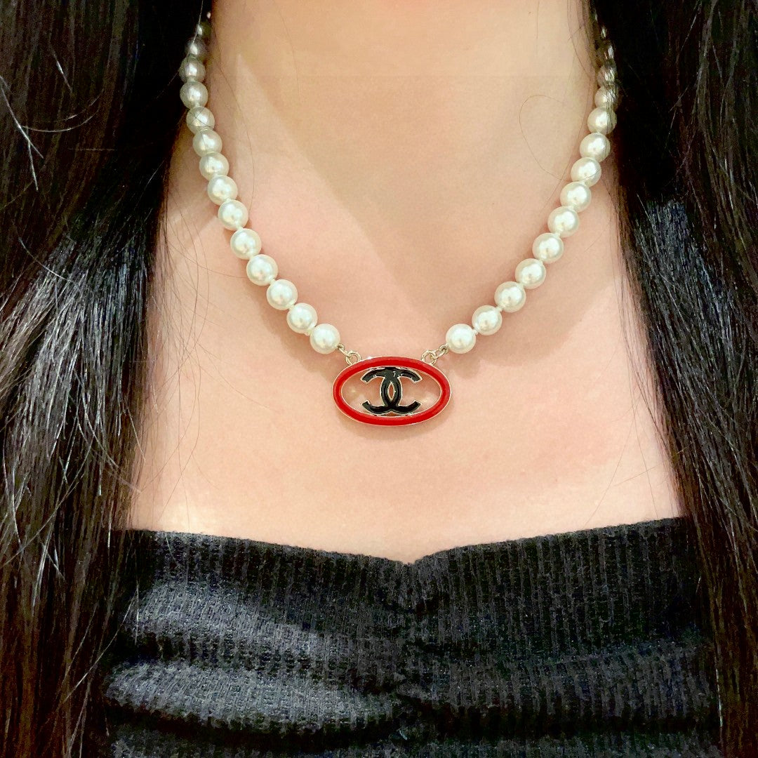 Double-C Emblem Pearl-Detail Pendant Necklace – Pearl Detail – Design 121 close-up detail