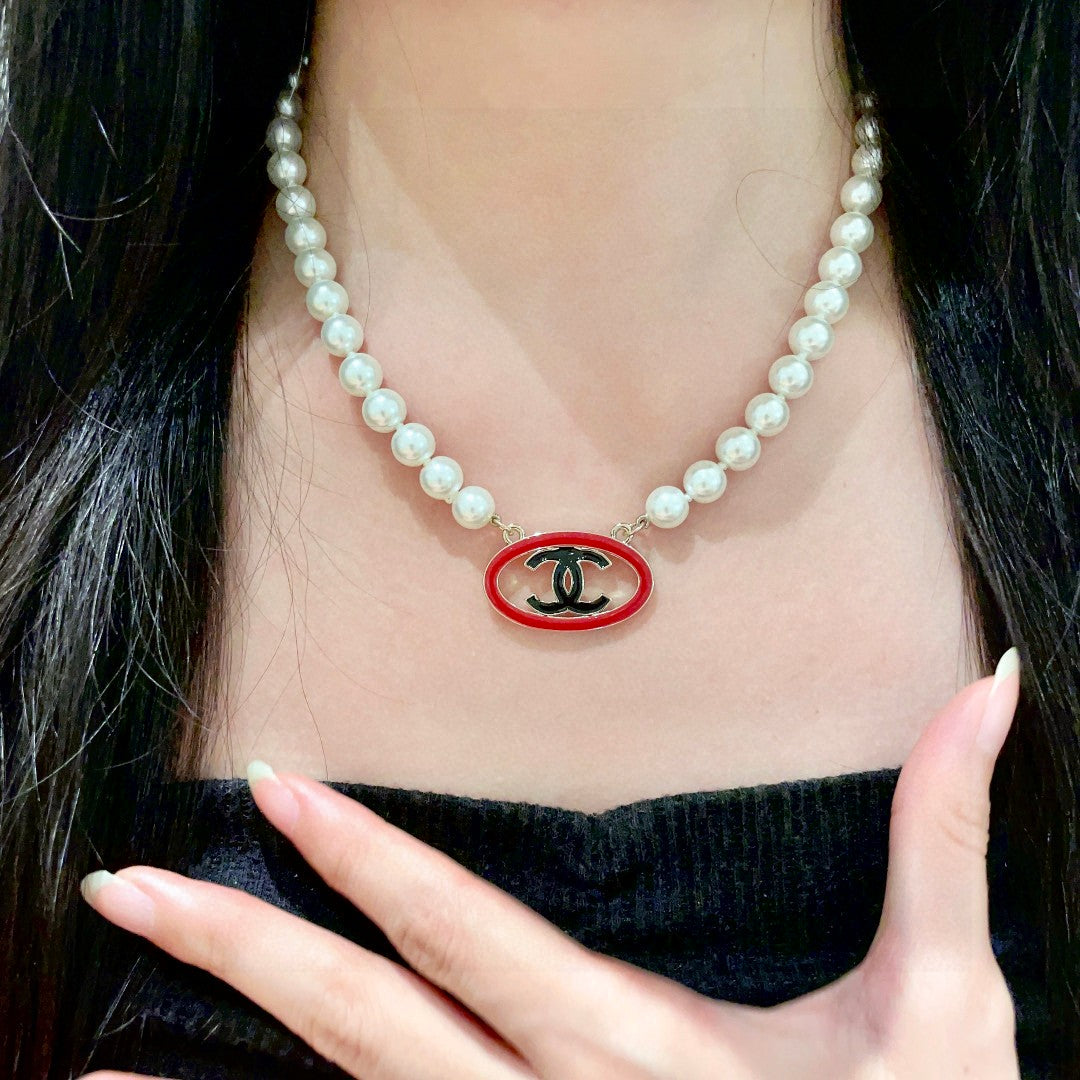 Double-C Emblem Pearl-Detail Pendant Necklace – Pearl Detail – Design 121 side detail