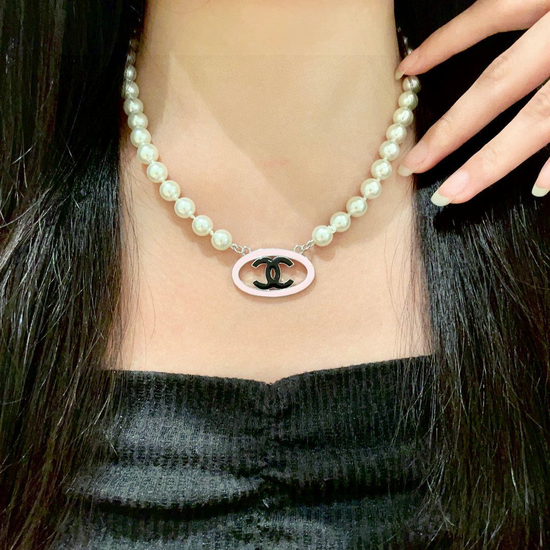 Double-C Emblem Pearl-Detail Pendant Necklace – Pearl Detail – Design 120 main product view