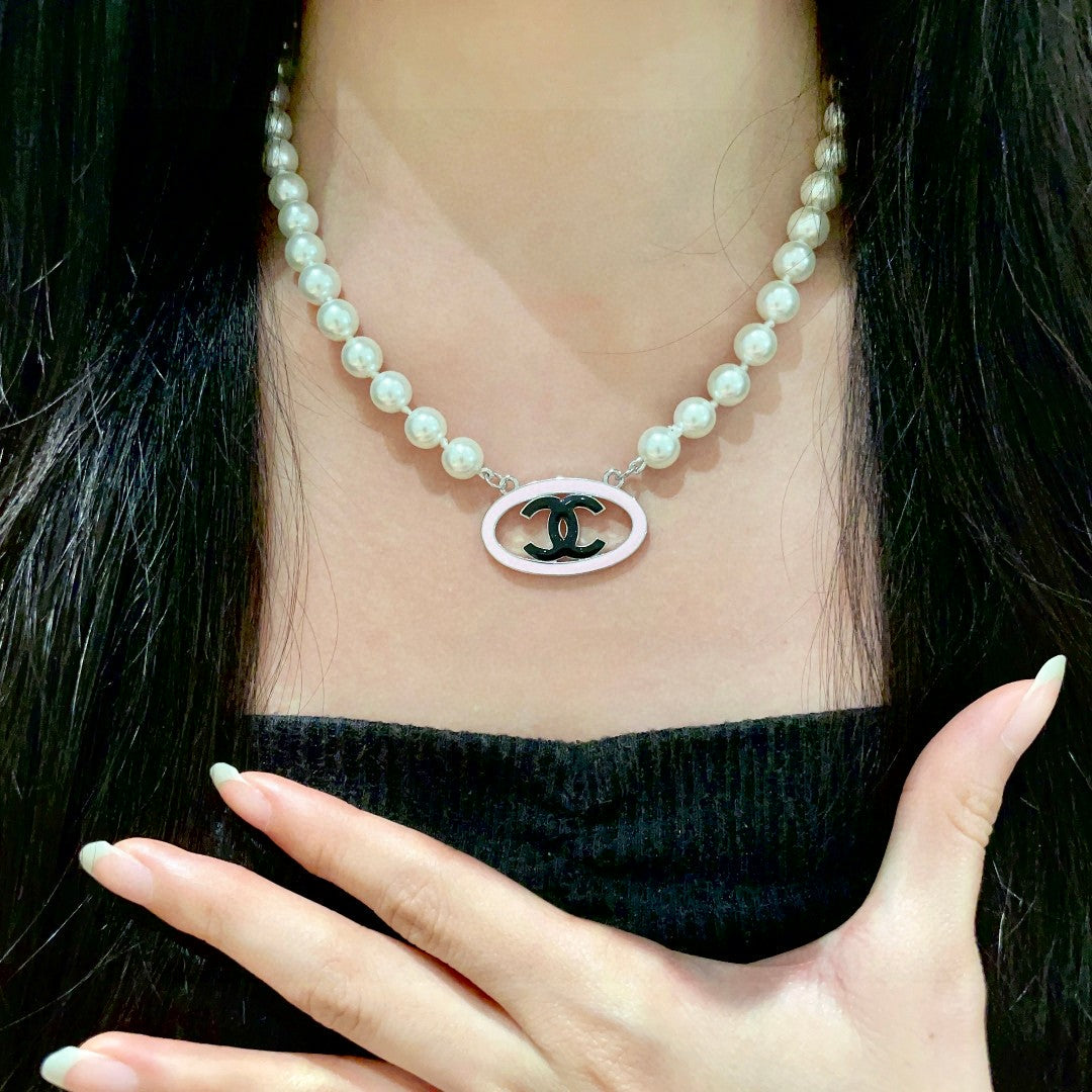 Double-C Emblem Pearl-Detail Pendant Necklace – Pearl Detail – Design 120 front product view