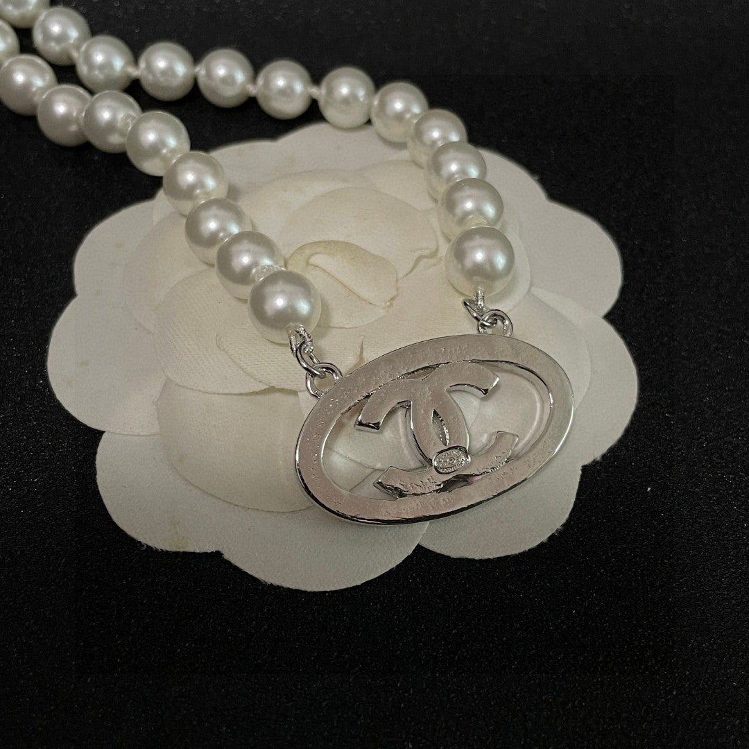 Double-C Emblem Pearl-Detail Pendant Necklace – Pearl Detail – Design 120 front product view