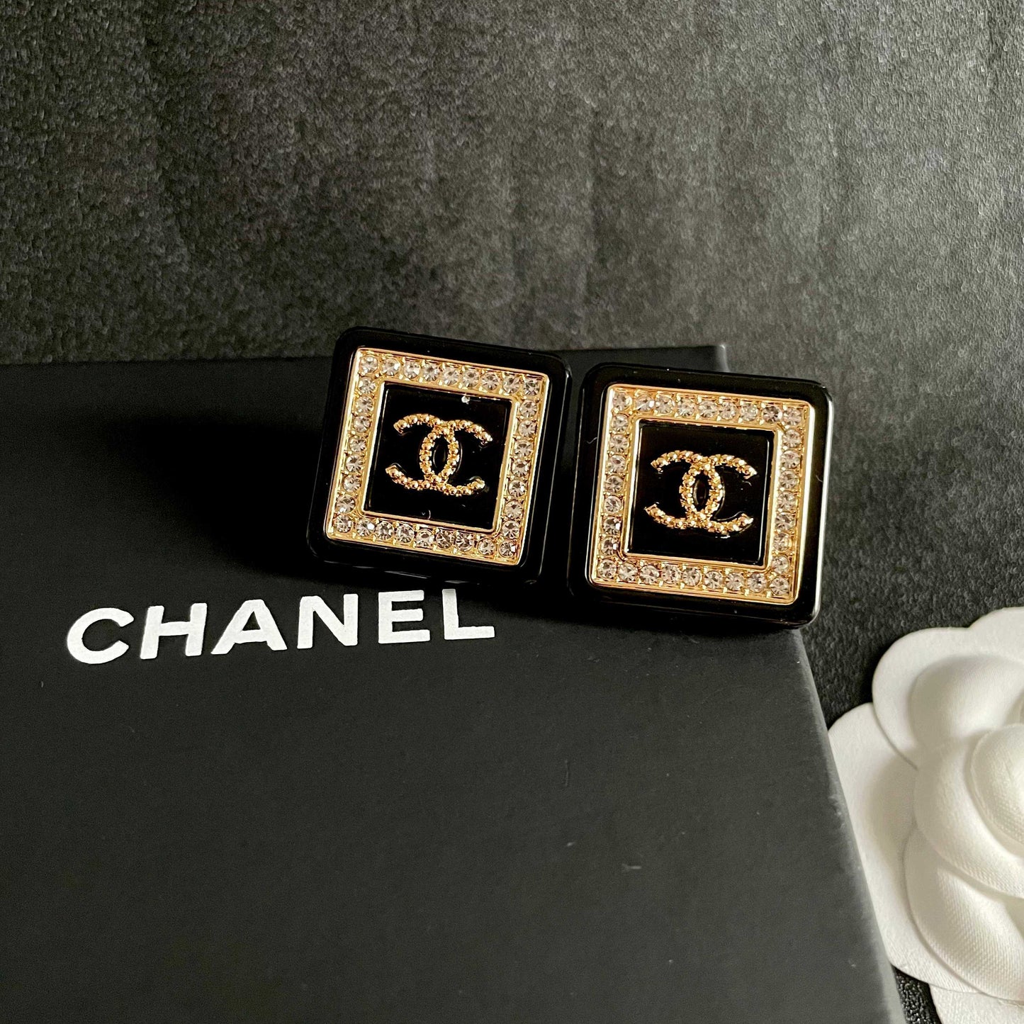 Double-C Emblem Stud Earrings in Polished Metal-Tone – Design 064 detail view