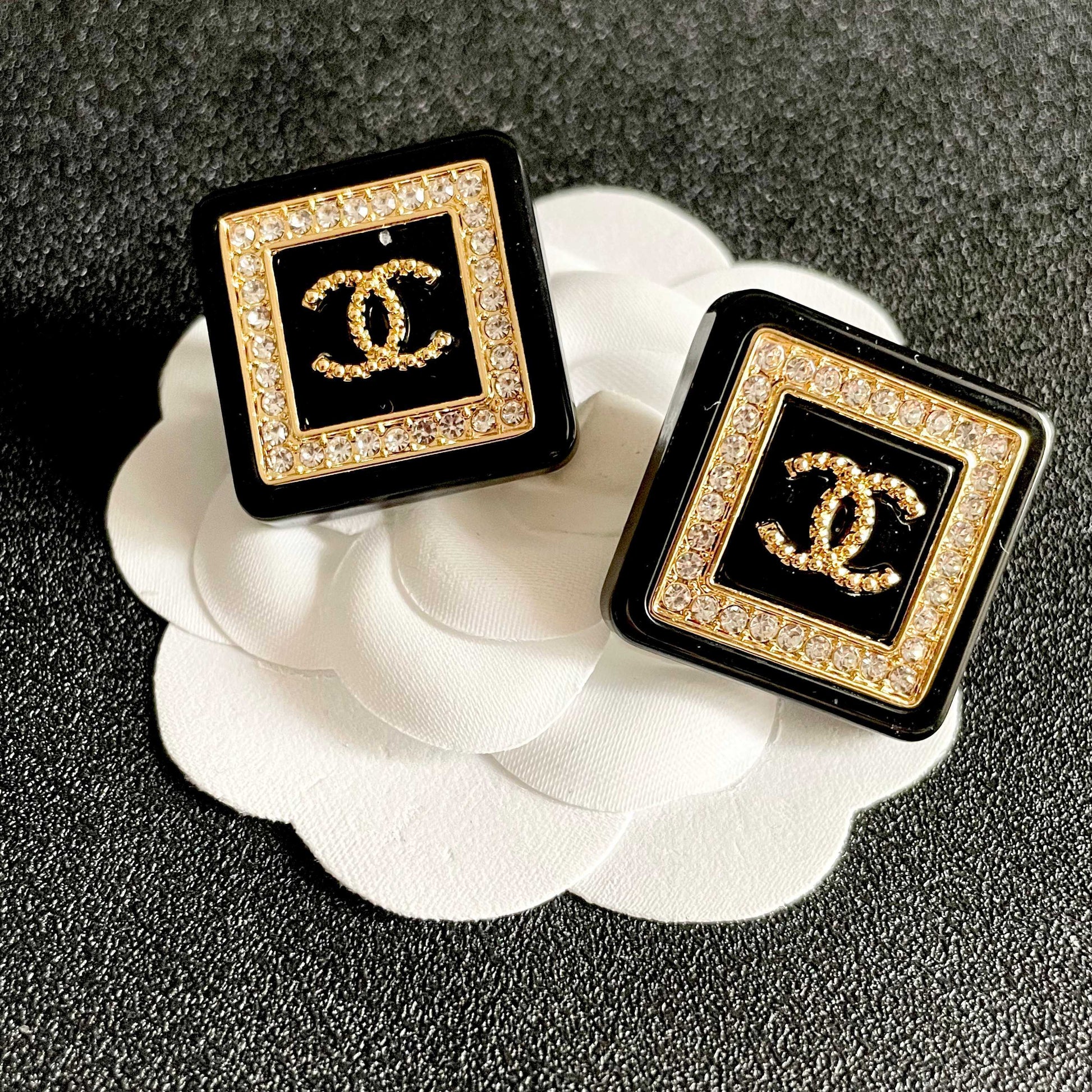 Double-C Emblem Stud Earrings in Polished Metal-Tone – Design 064 front product view