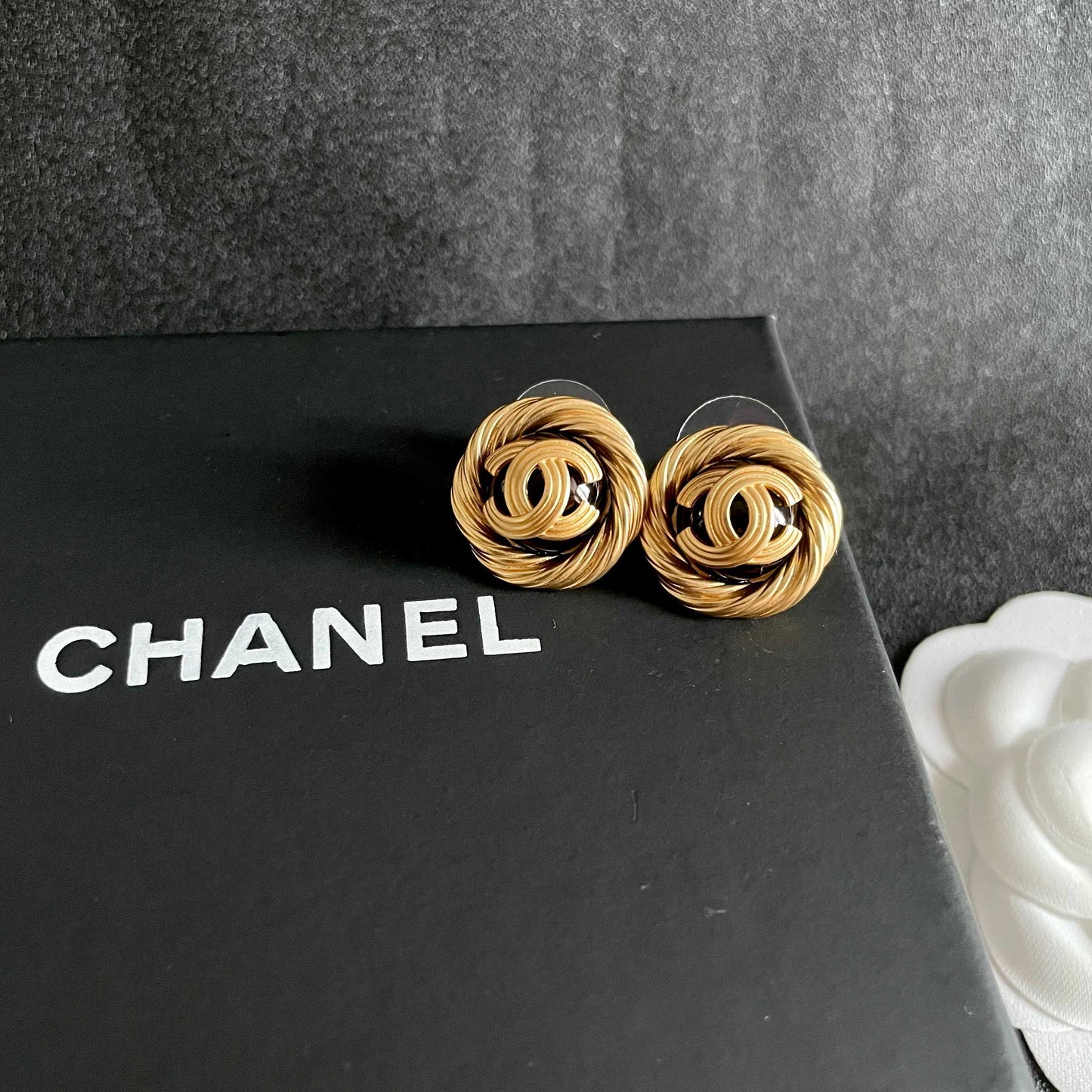 Double-C Emblem Stud Earrings in Polished Metal-Tone – Design 063 detail view