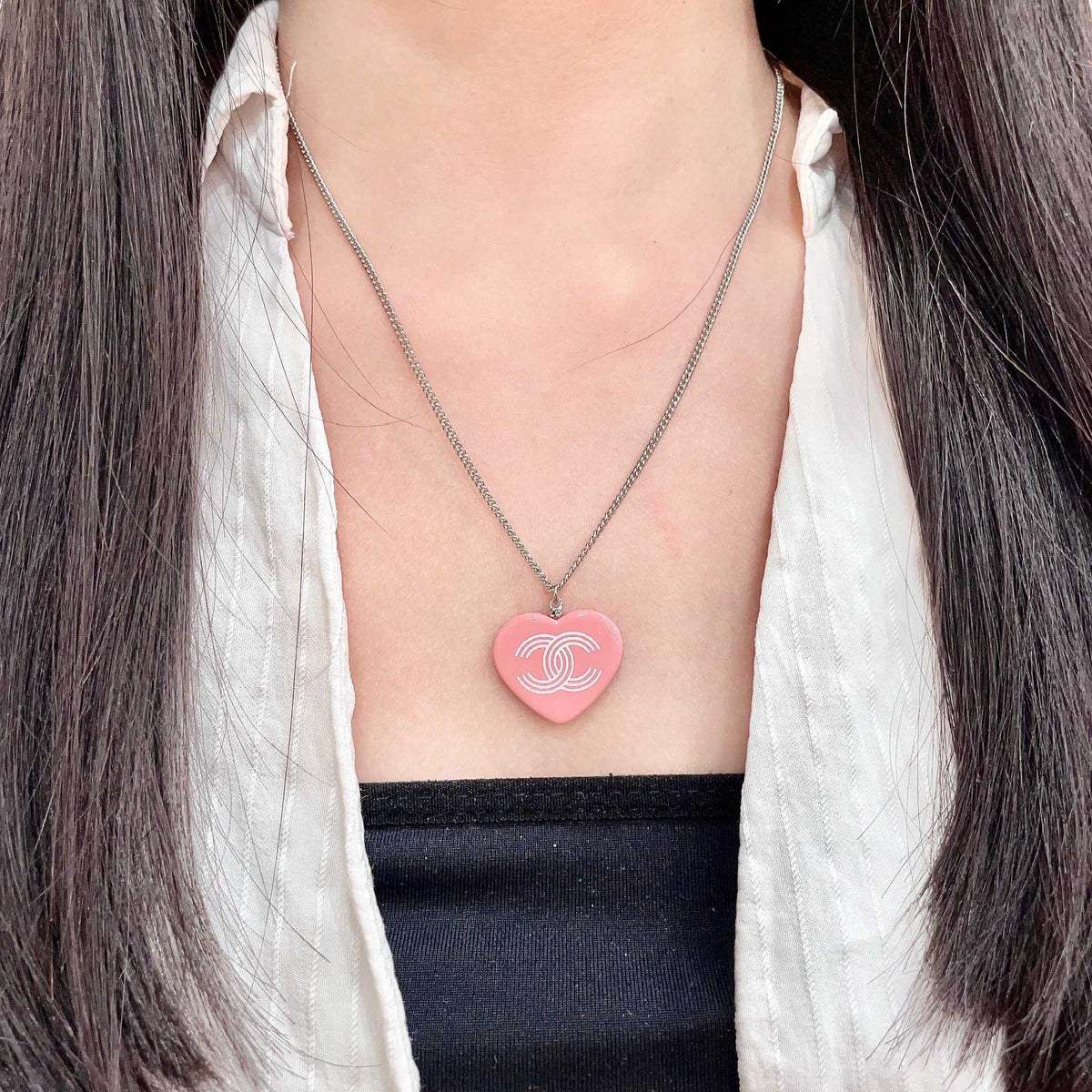 Double-C Emblem Pendant Necklace in Polished Metal-Tone – Heart Detail detail view