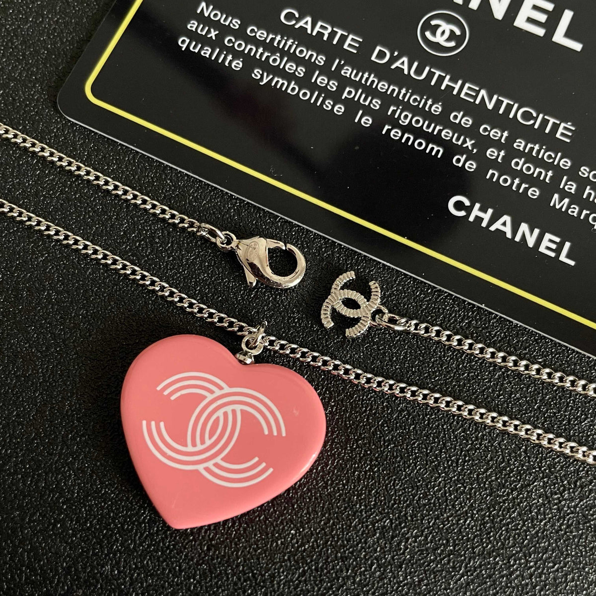 Double-C Emblem Pendant Necklace in Polished Metal-Tone – Heart Detail main product view