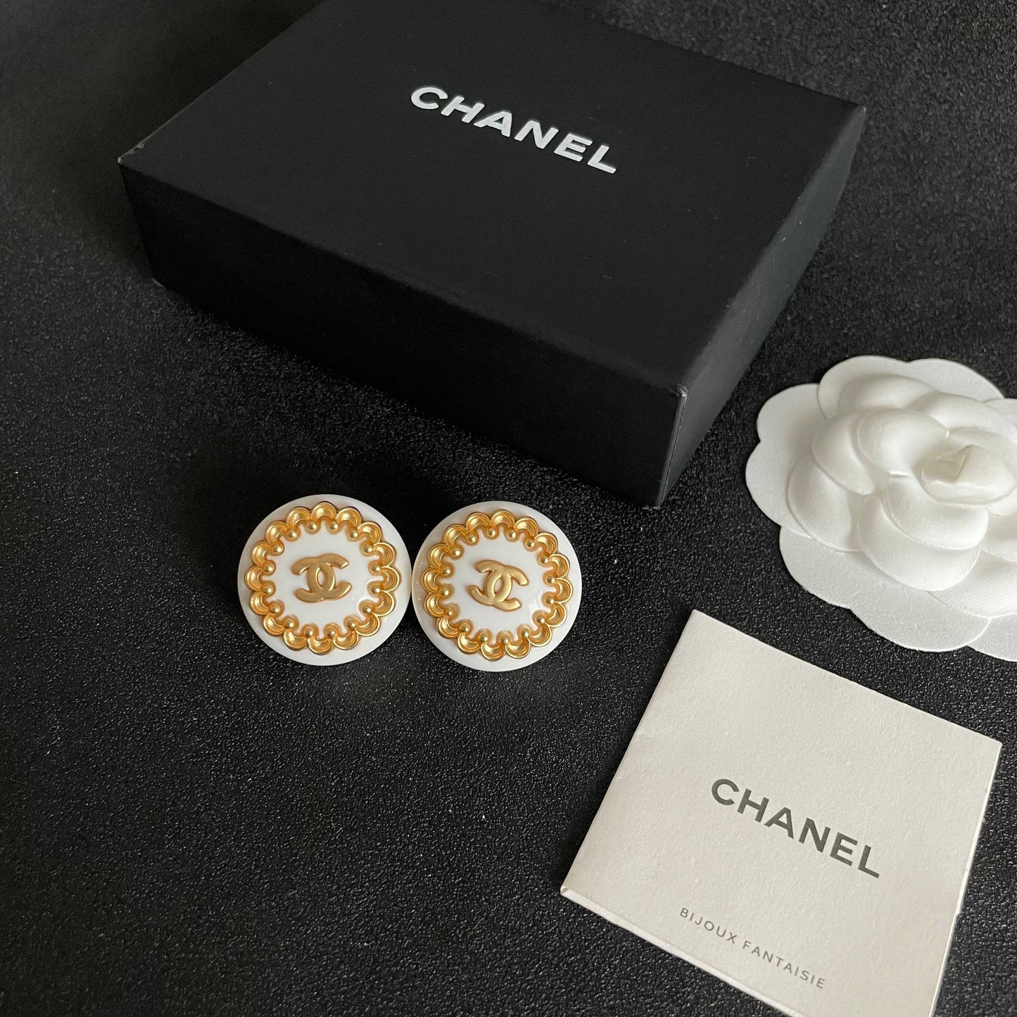 Double-C Emblem Stud Earrings in Polished Metal-Tone – Design 061 close-up detail