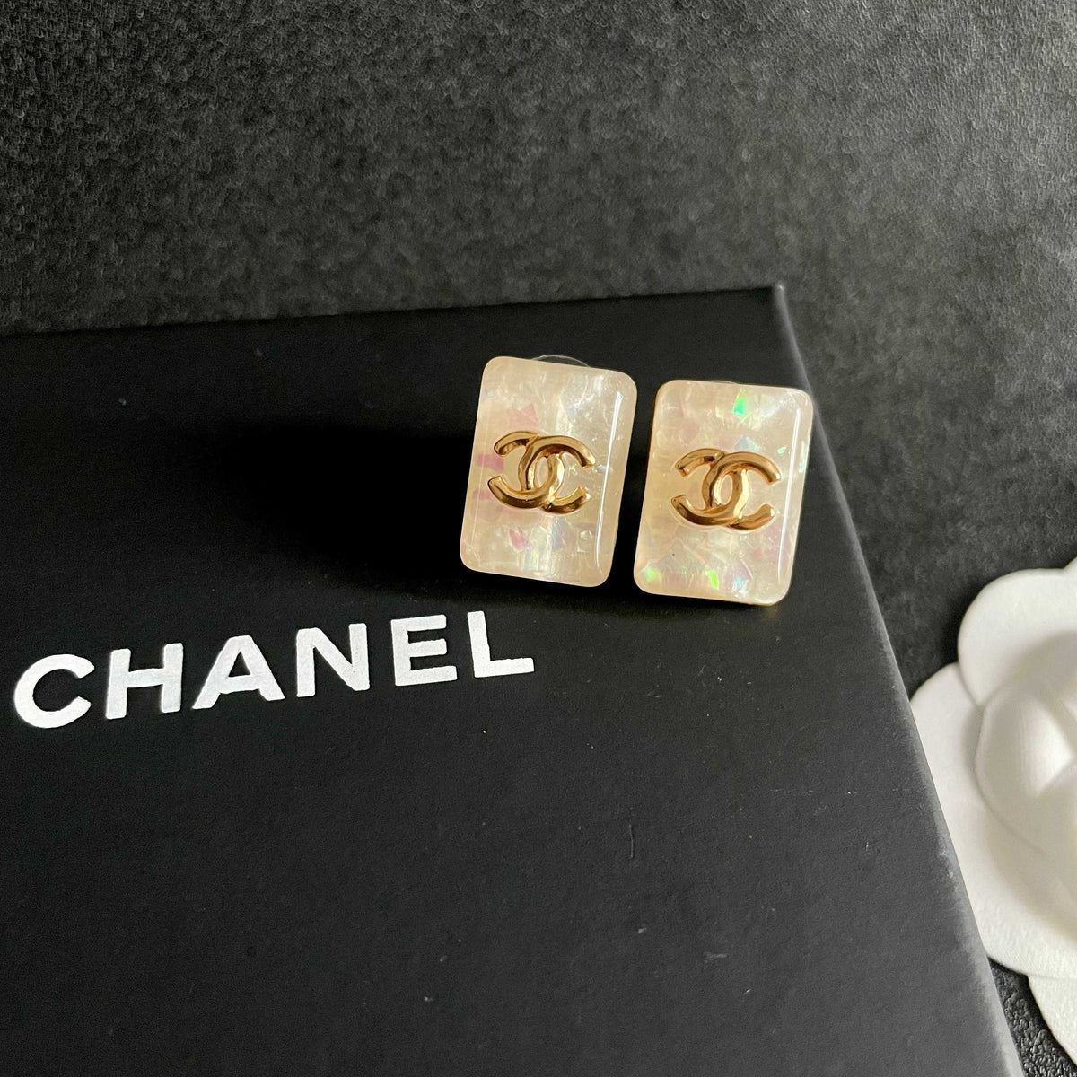 Double-C Emblem Stud Earrings in Polished Metal-Tone – Design 060 detail view
