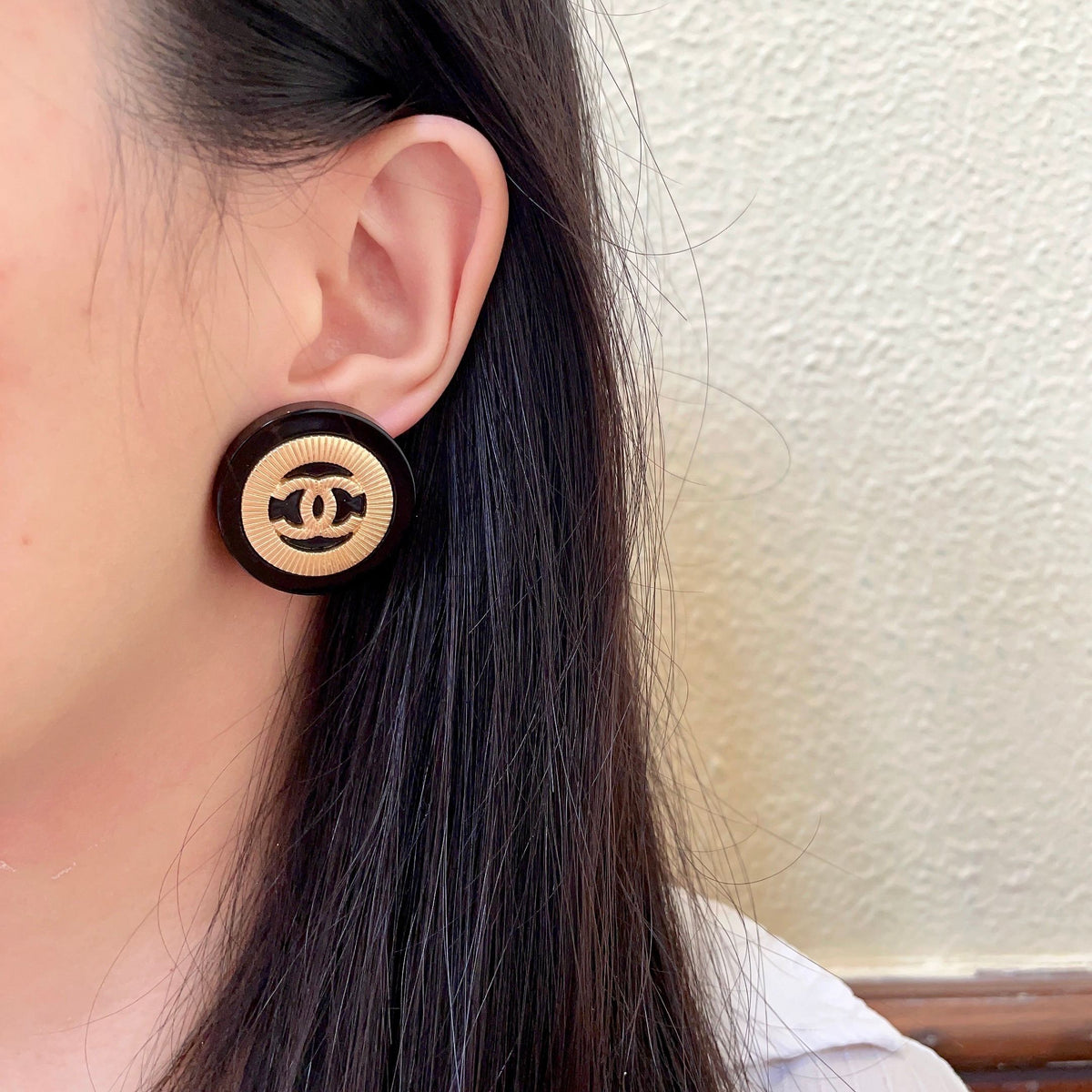 Double-C Emblem Stud Earrings in Polished Metal-Tone – Design 010 detail view