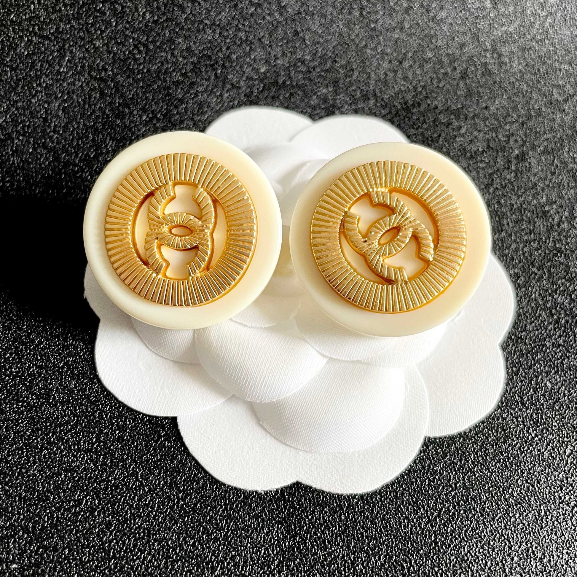 Double-C Emblem Stud Earrings in Polished Metal-Tone – Design 040 front product view
