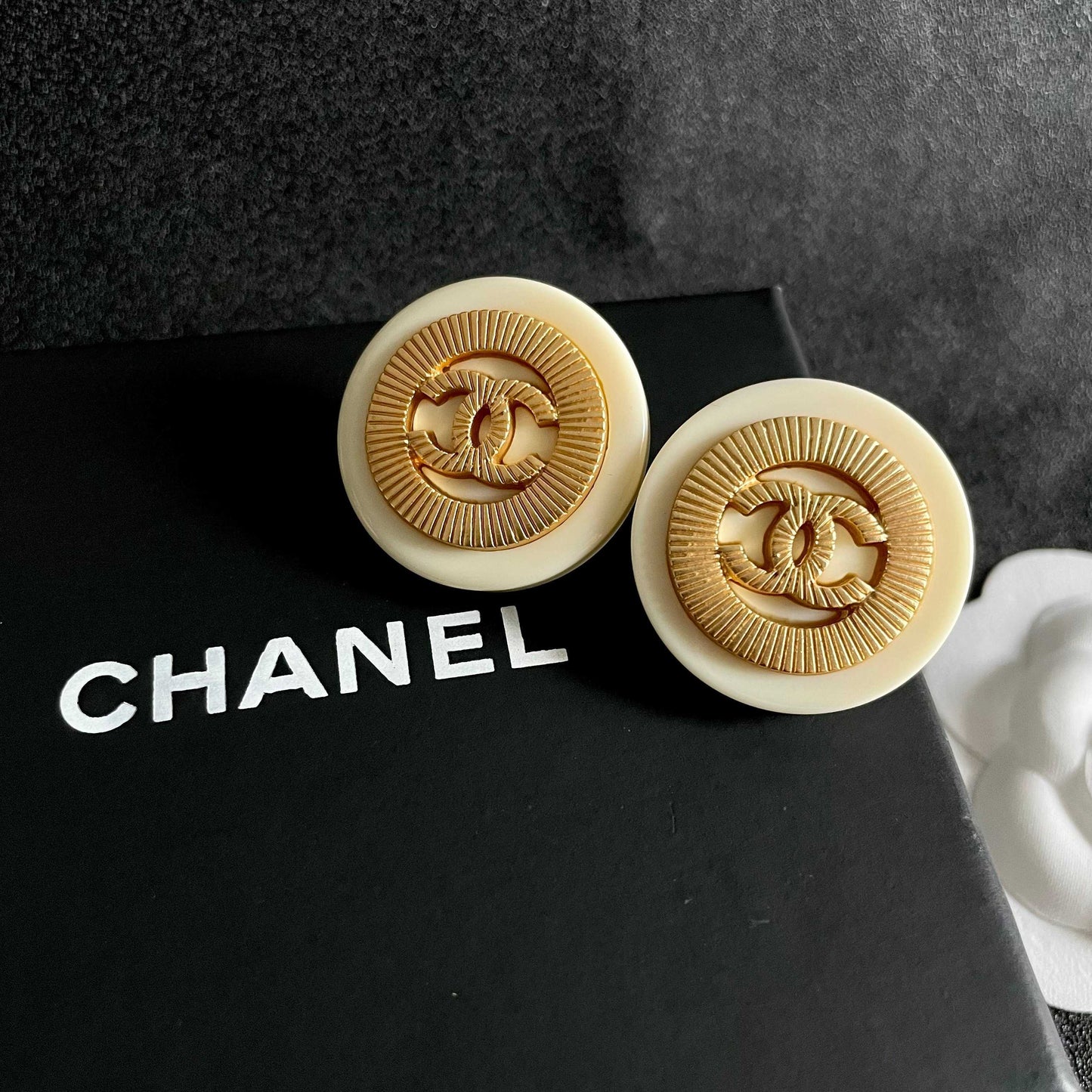 Double-C Emblem Stud Earrings in Polished Metal-Tone – Design 052 detail view
