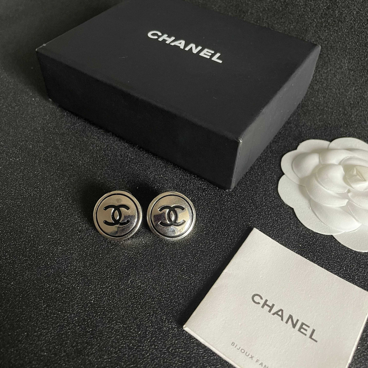 Double-C Emblem Stud Earrings in Polished Metal-Tone – Design 046 close-up detail