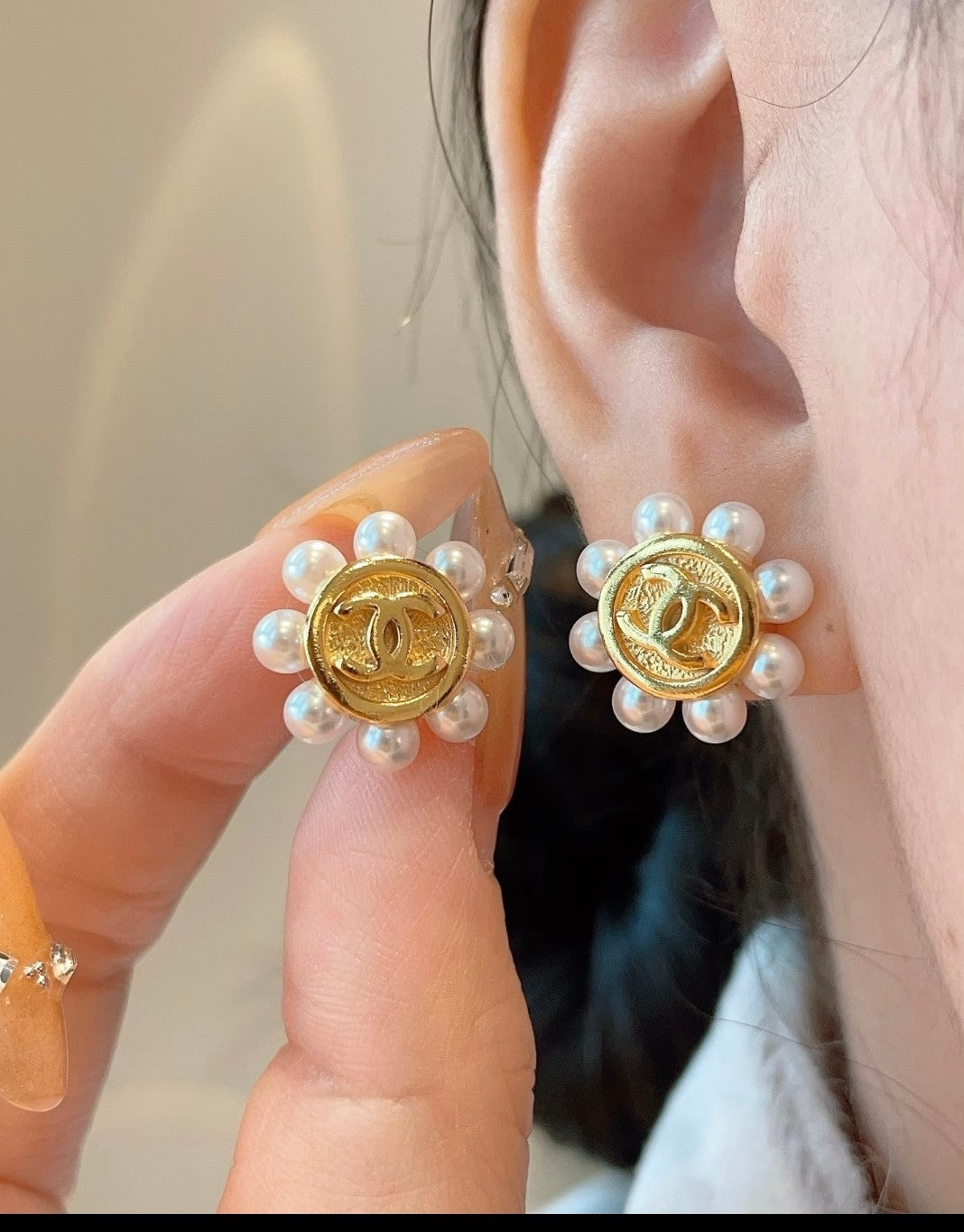 Double-C Emblem Stud Earrings in Polished Metal-Tone – Design 299 detail view