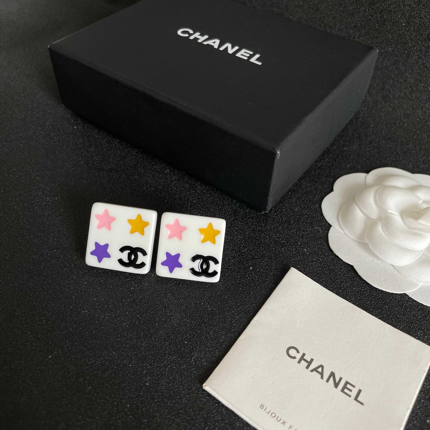 Double-C Emblem Stud Earrings in Polished Metal-Tone – Star Detail – Design 009 close-up detail