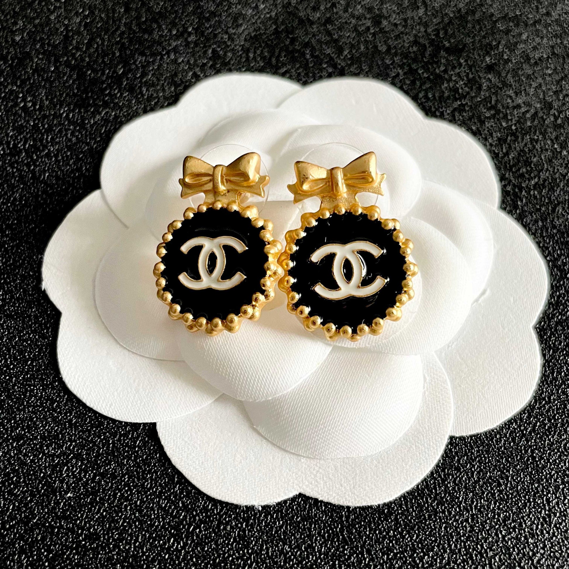 Double-C Emblem Stud Earrings in Polished Metal-Tone – Design 208 front product view