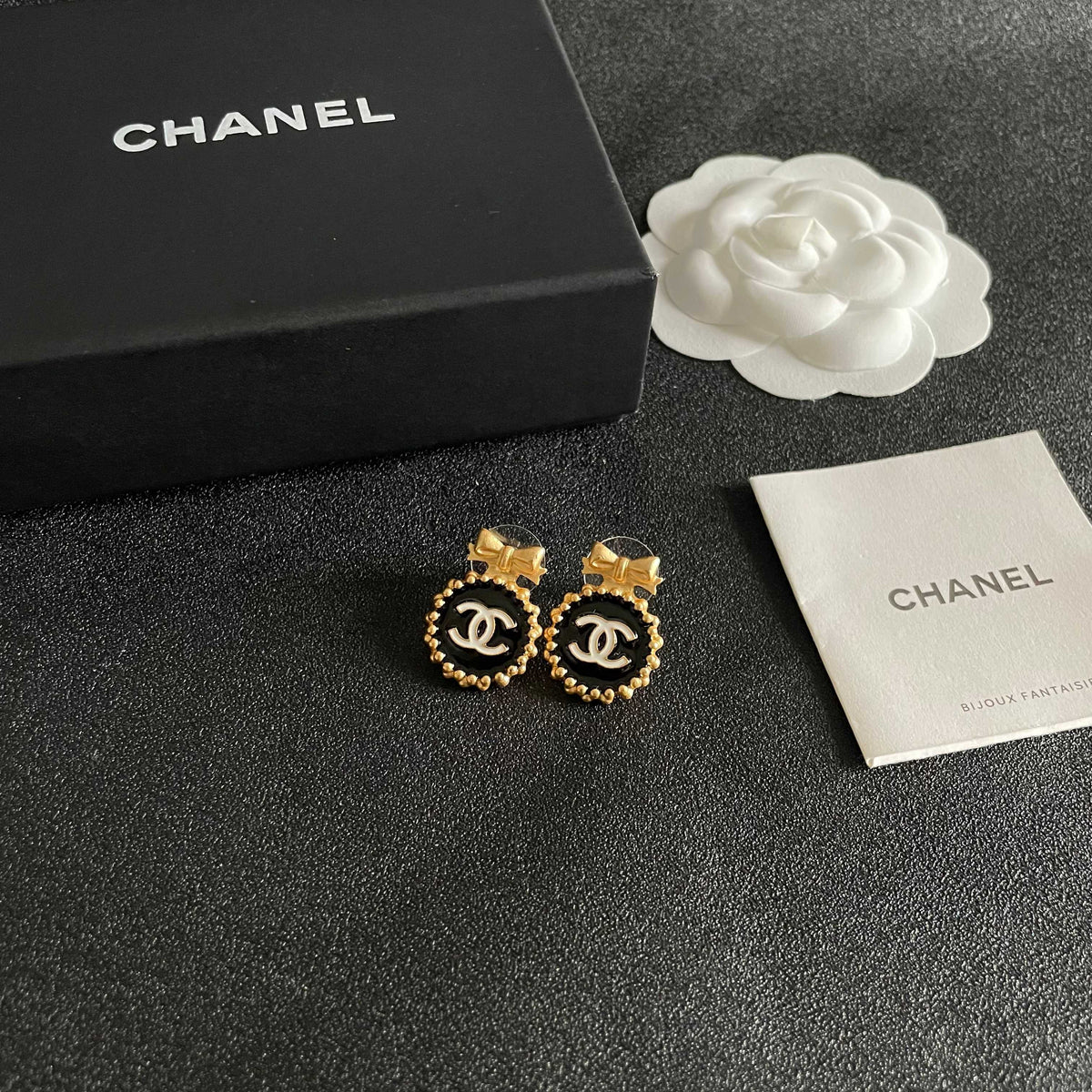 Double-C Emblem Stud Earrings in Polished Metal-Tone – Design 208 styled product view