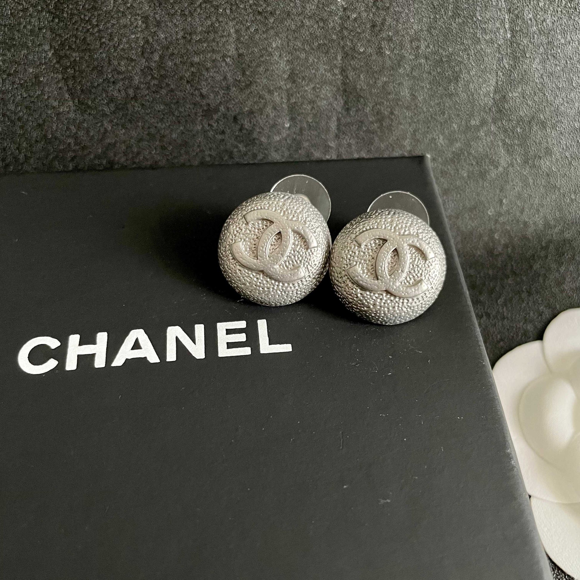 Double-C Emblem Stud Earrings in Polished Metal-Tone – Design 206 detail view