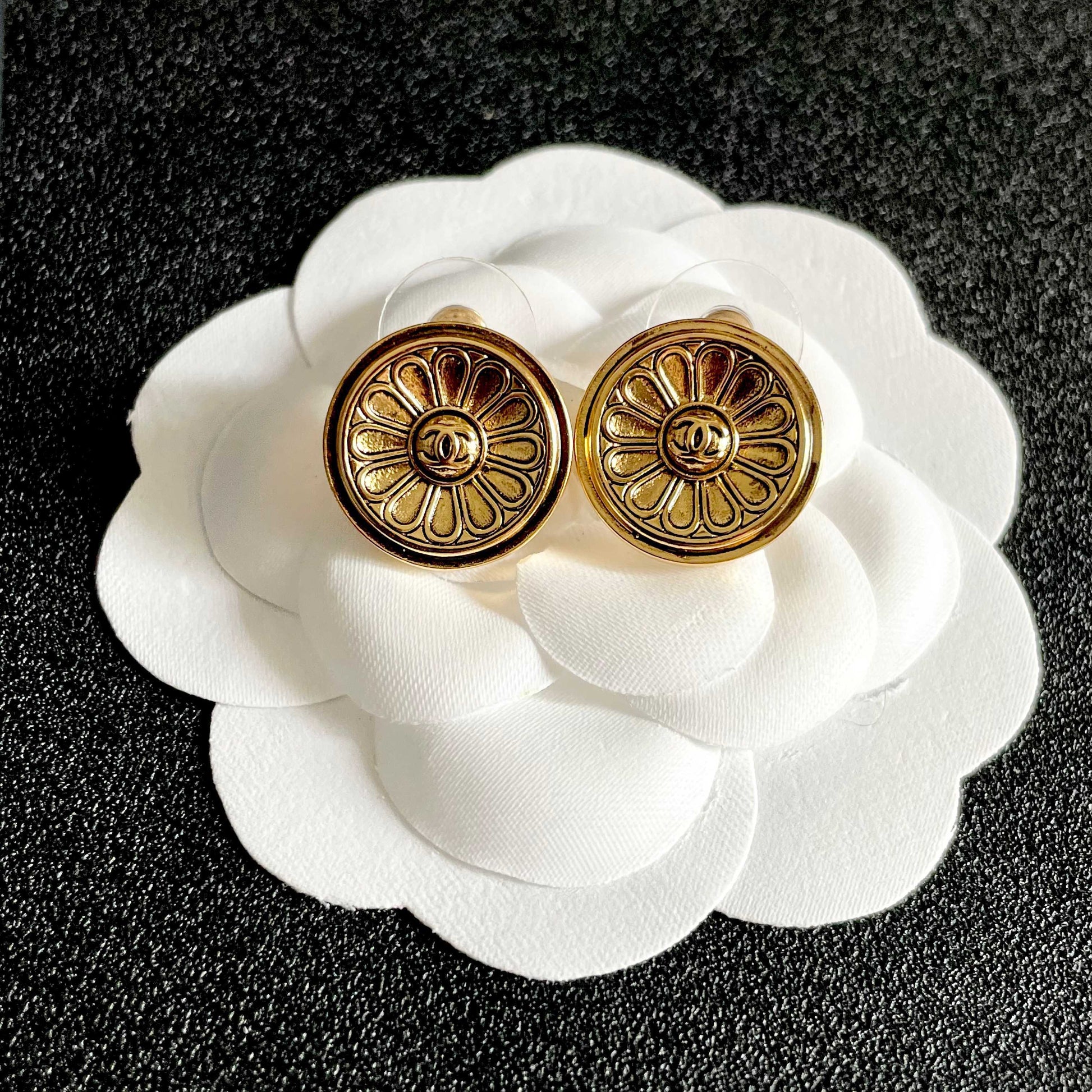 Double-C Emblem Stud Earrings in Polished Metal-Tone – Design 205 front product view
