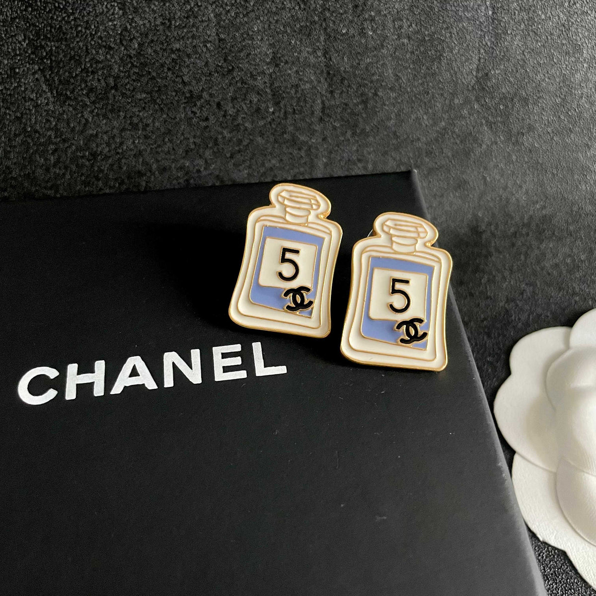 Double-C Emblem Stud Earrings in Polished Metal-Tone – Design 219 detail view