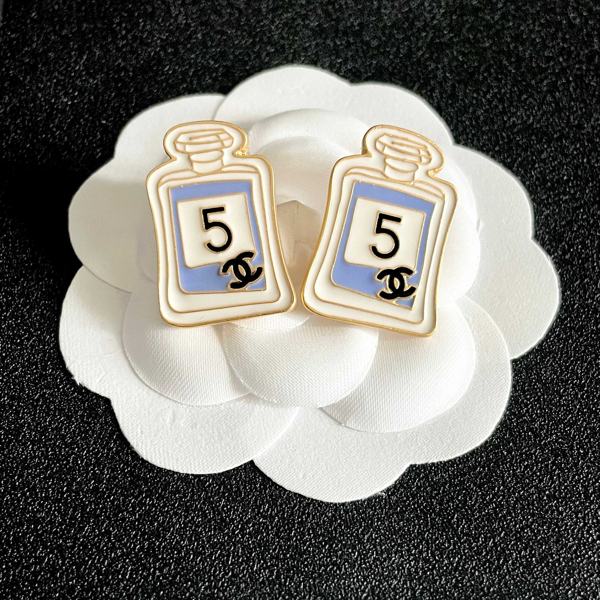 Double-C Emblem Stud Earrings in Polished Metal-Tone – Design 219 front product view