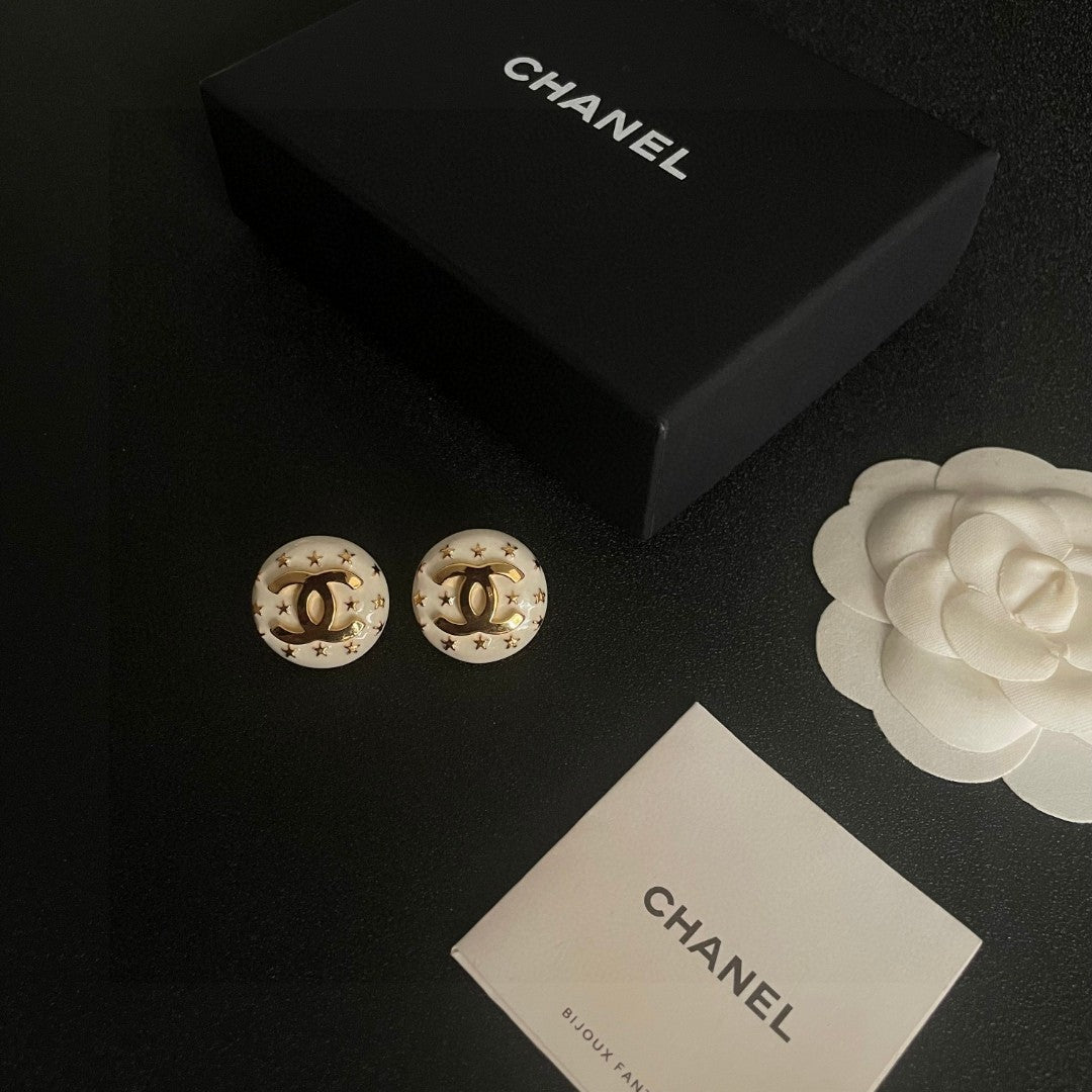Double-C Emblem Stud Earrings in Polished Metal-Tone – Star Detail – Design 017 close-up detail