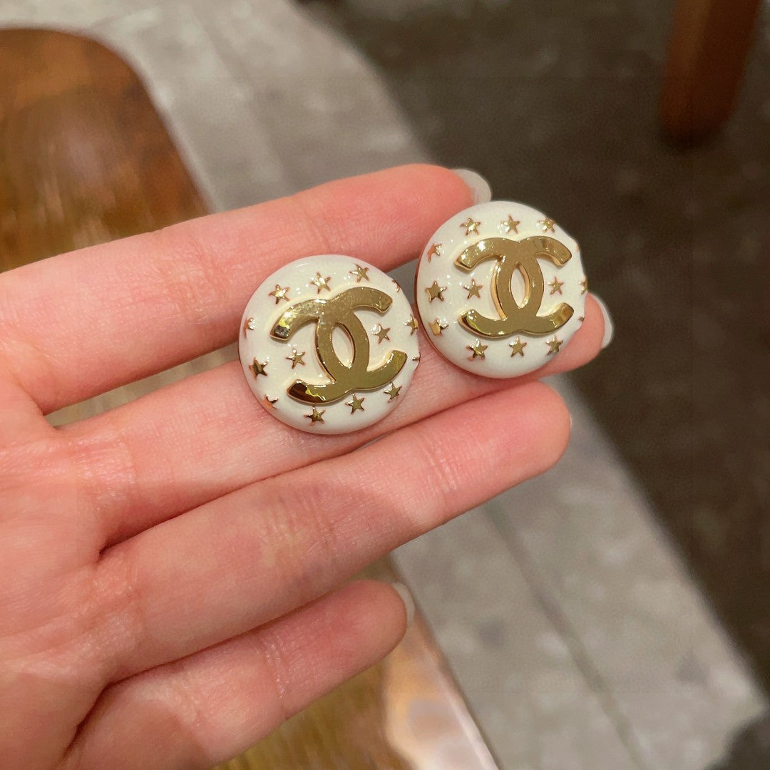 Double-C Emblem Stud Earrings in Polished Metal-Tone – Star Detail – Design 017 side detail