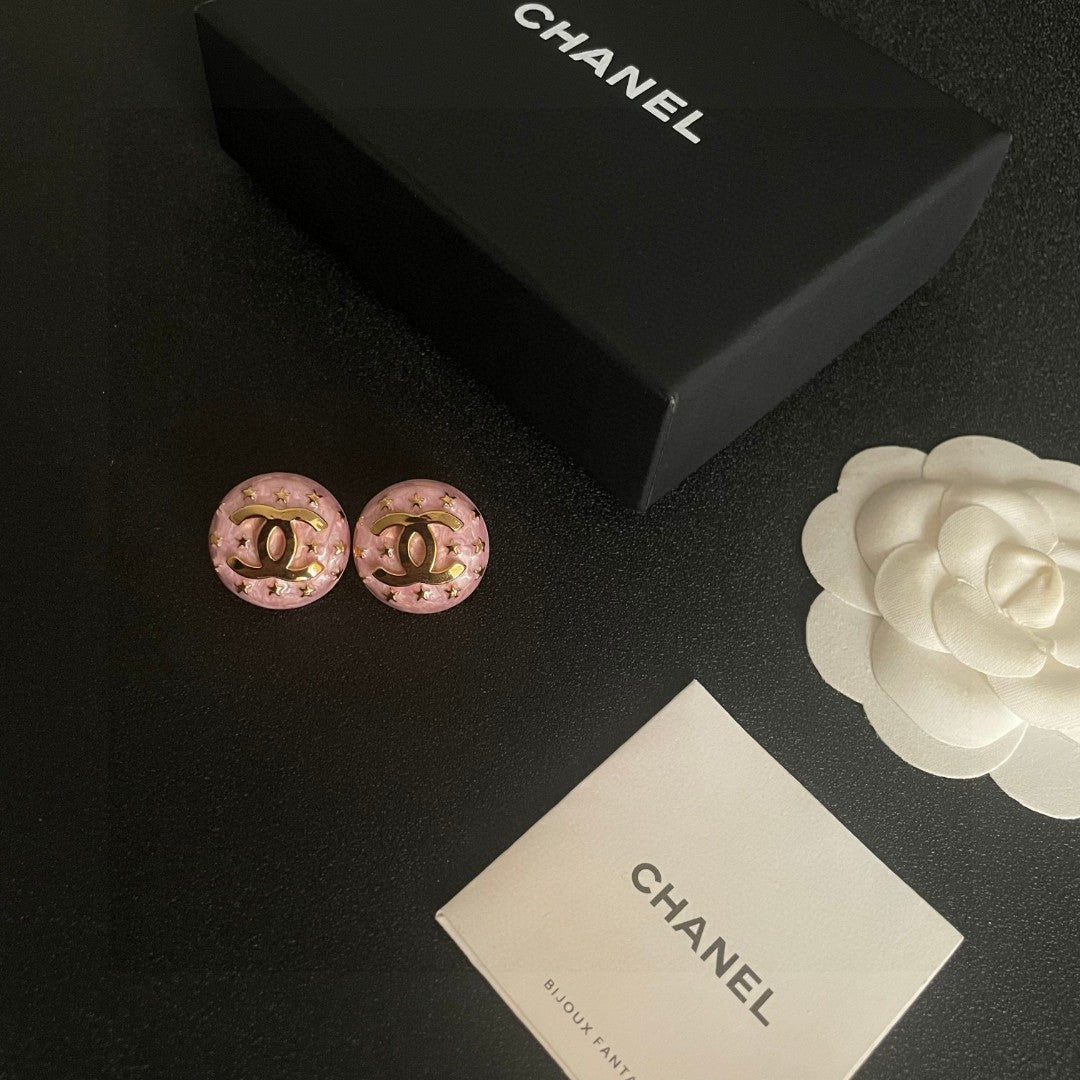 Double-C Emblem Stud Earrings in Polished Metal-Tone – Star Detail – Design 012 close-up detail