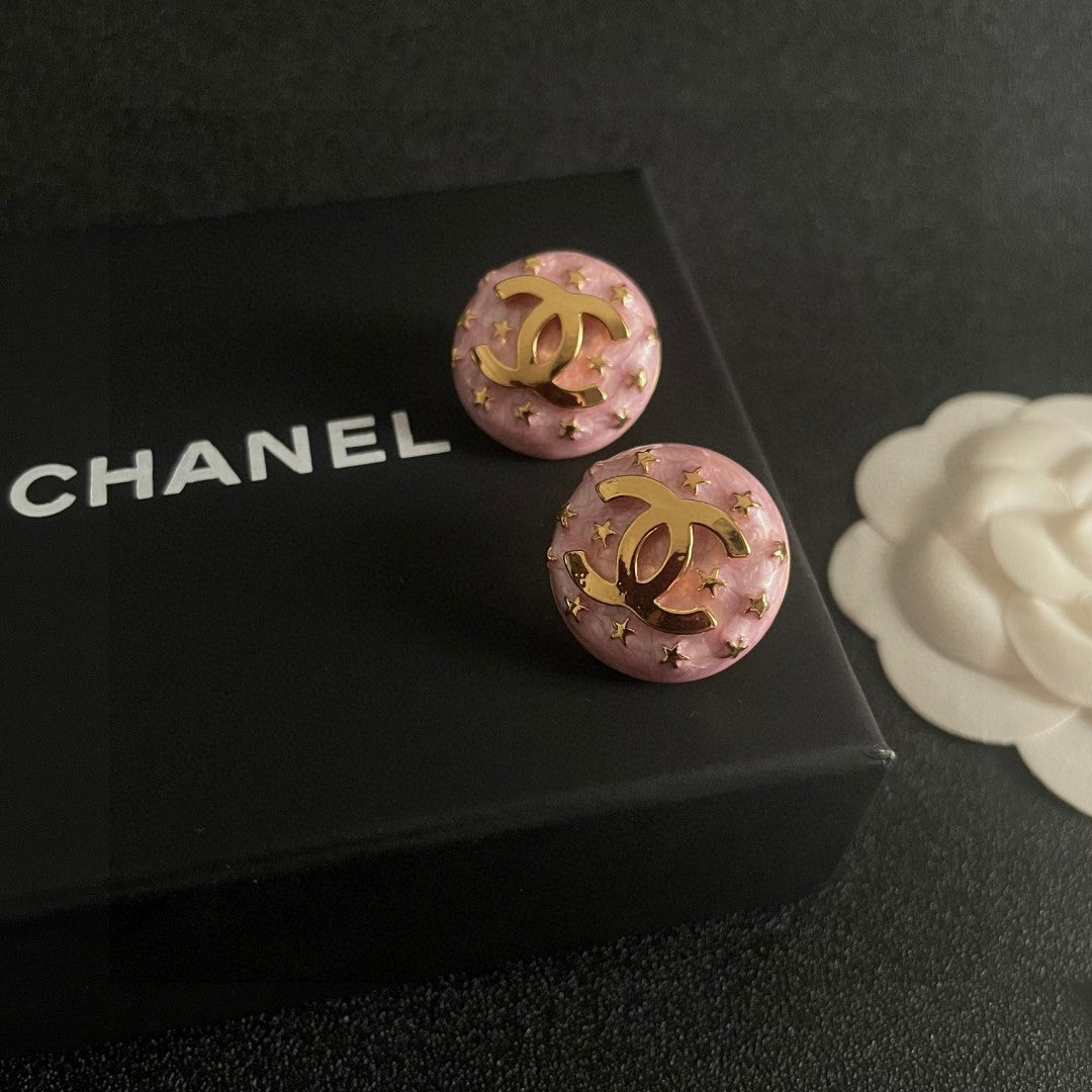 Double-C Emblem Stud Earrings in Polished Metal-Tone – Star Detail – Design 012 detail view