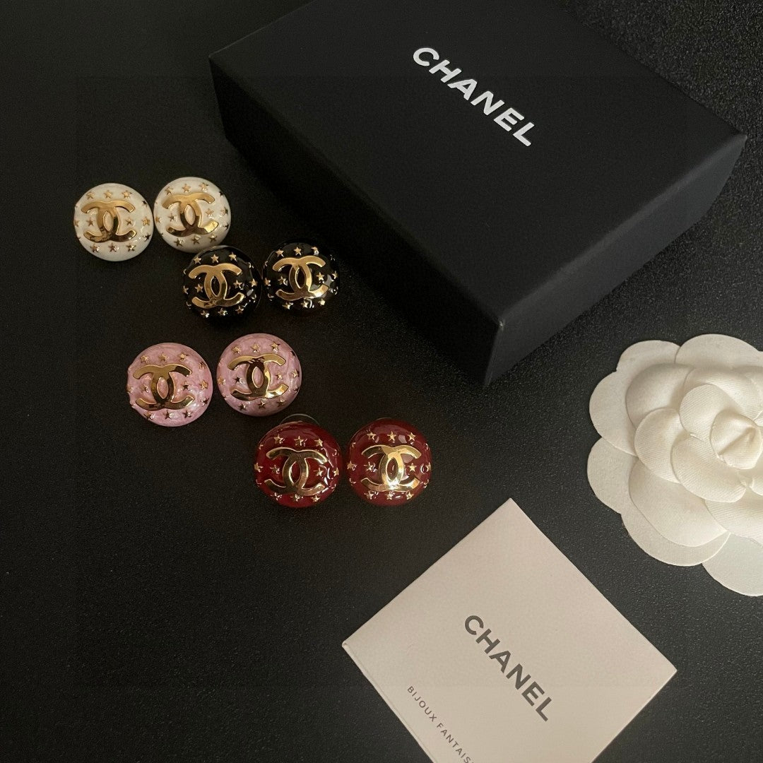 Double-C Emblem Stud Earrings in Polished Metal-Tone – Star Detail – Design 011 close-up detail